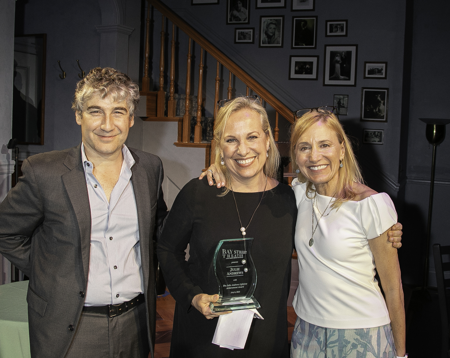 Bay Street's Artistic Director Scott Schwartz and Executive Director Tracy Mitchell with Emma Walton Hamilton, center, accepting Bay Street Theater's Lifetime Achievement Award for her mother, Julie Andrews. LENNY STUCKER