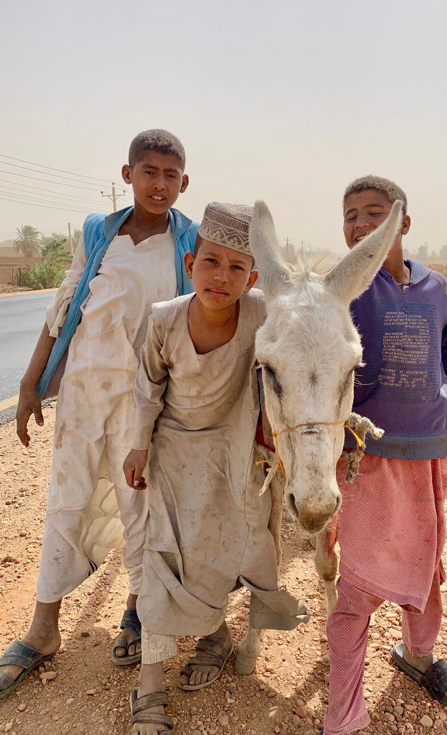 Kids outside of Khartoum, Sudan. COURSTESY JOE LOUCHHEIM