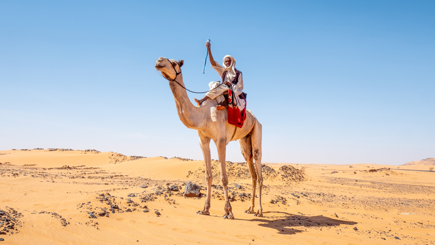 A Sudanese bedouin camel rider. COURSTESY JOE LOUCHHEIM