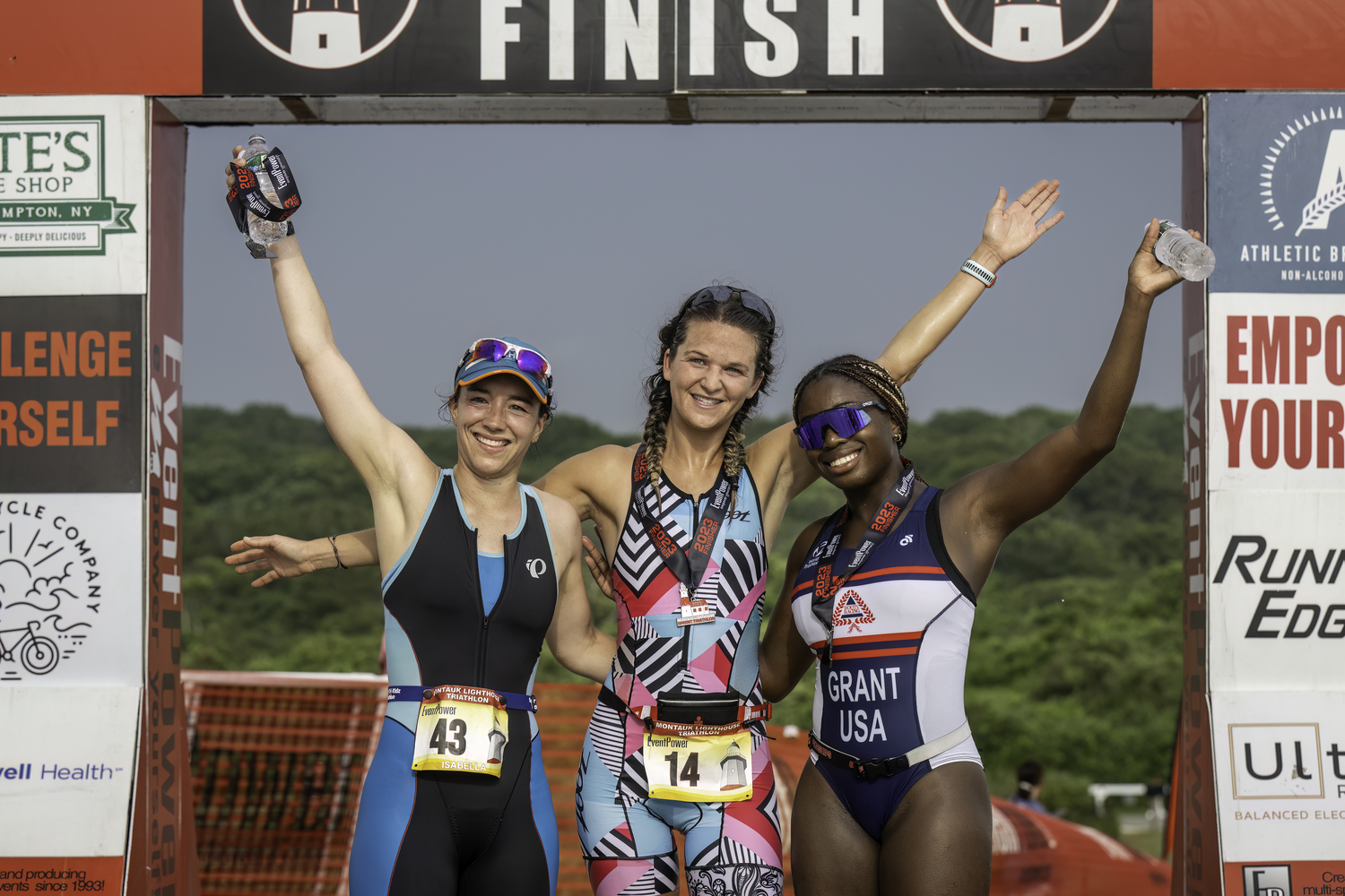 The top three female finishers, from left, Isabella Olgaard, Katrina Garry and Morgan Grant.   MARIANNE BARNETT