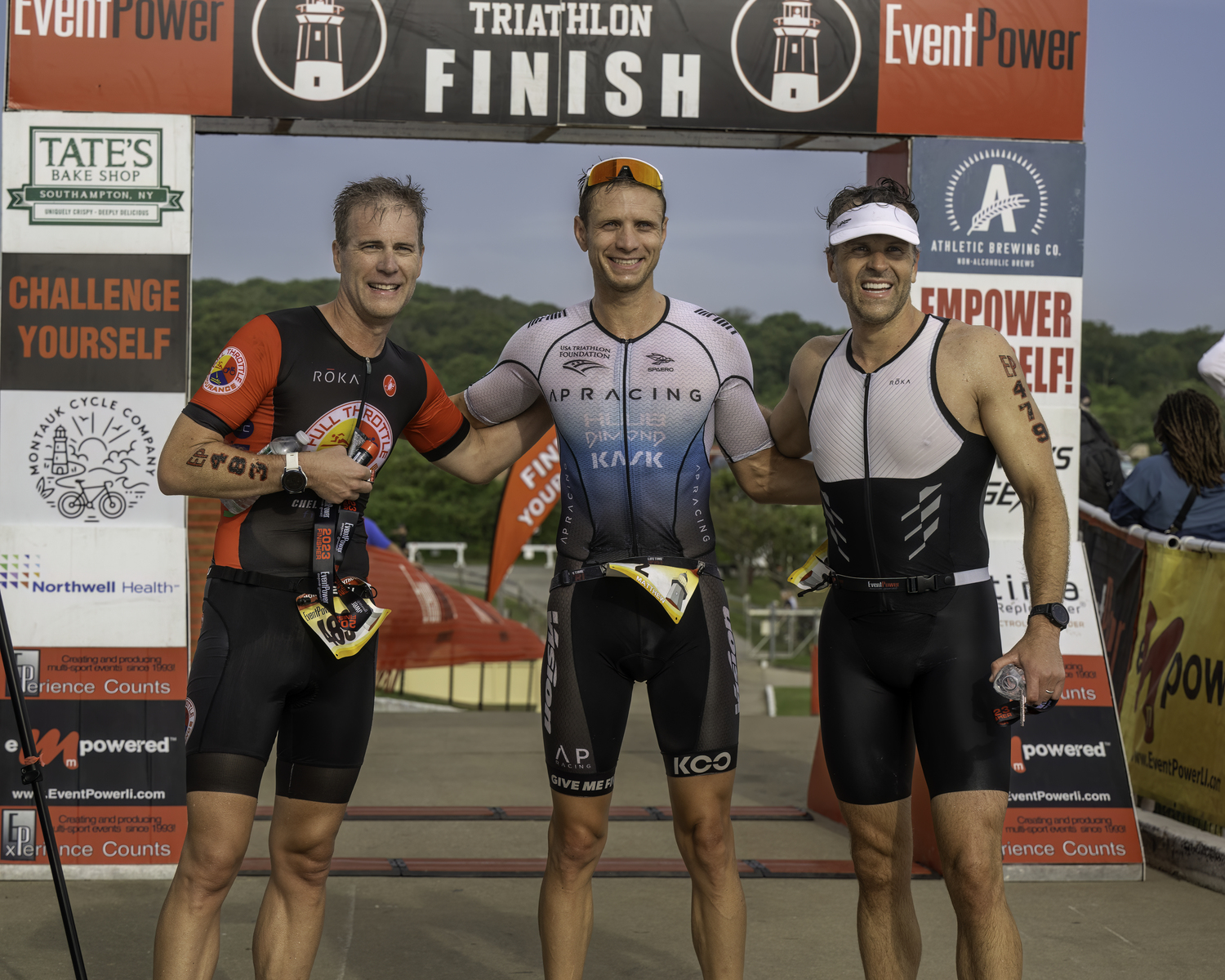 The top three overall finishers, from left, Mark Lucas, Matthew Raske and Shawn Faurot.   MARIANNE BARNETT