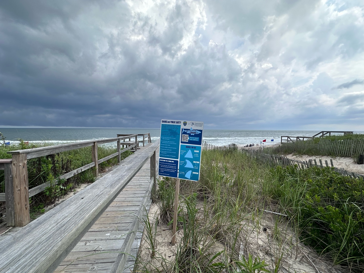 A shark advisory sign at Quogue Village Beach. JOHN PAUL FERRANTINO