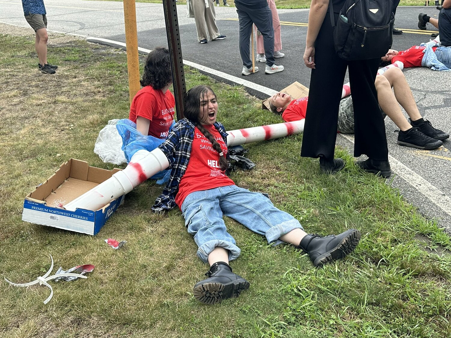 Protesters attempted to block access to East Hampton Airport, to protest the outsized contribution that private aircraft usage has on climate change. 
MARGARET KLEIN