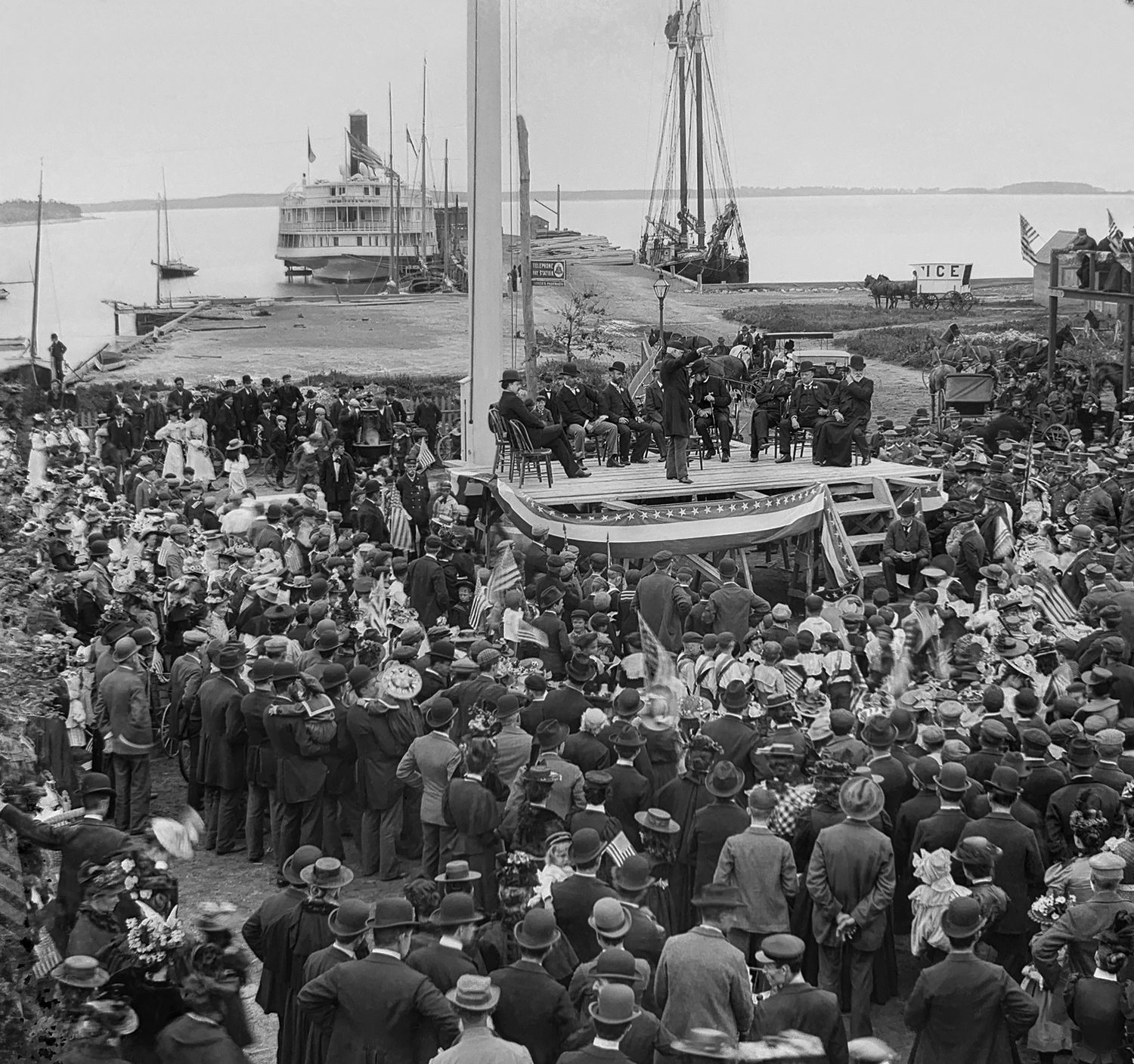 The dedication of a new flagpole at the foot of Long Wharf brought out a huge crowd in Sag Harbor. WILLIAM G. HOWARD