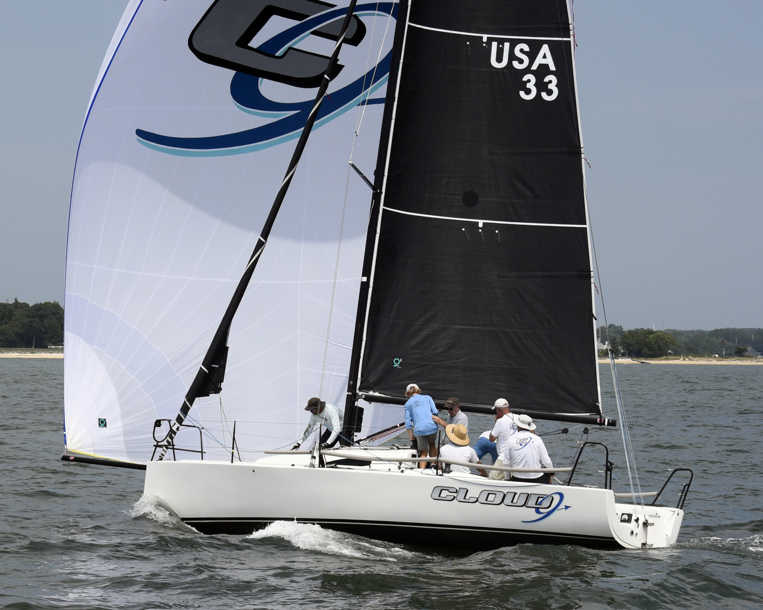 Skipper John Sommi’s Cloud 9 flying downwind to second place in Spinnaker Division 1.  MICHAEL MELLA