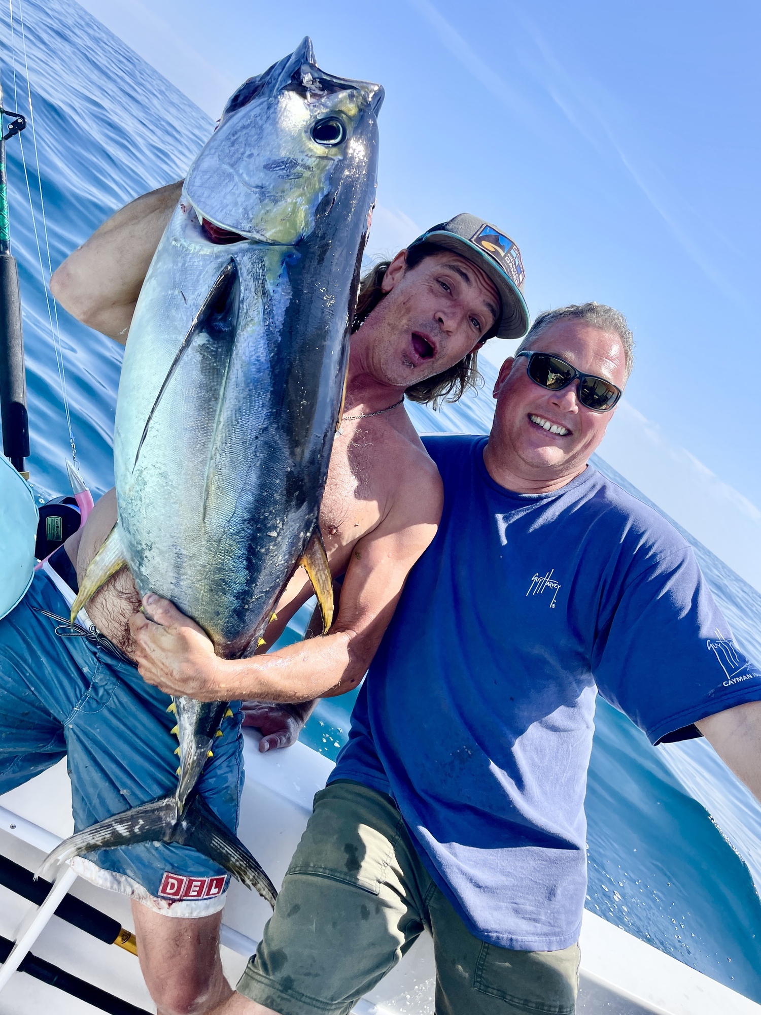 Jay Dell and Keith Robertson were in a celebratory mood after landing this fat yellowfin tuna recently.