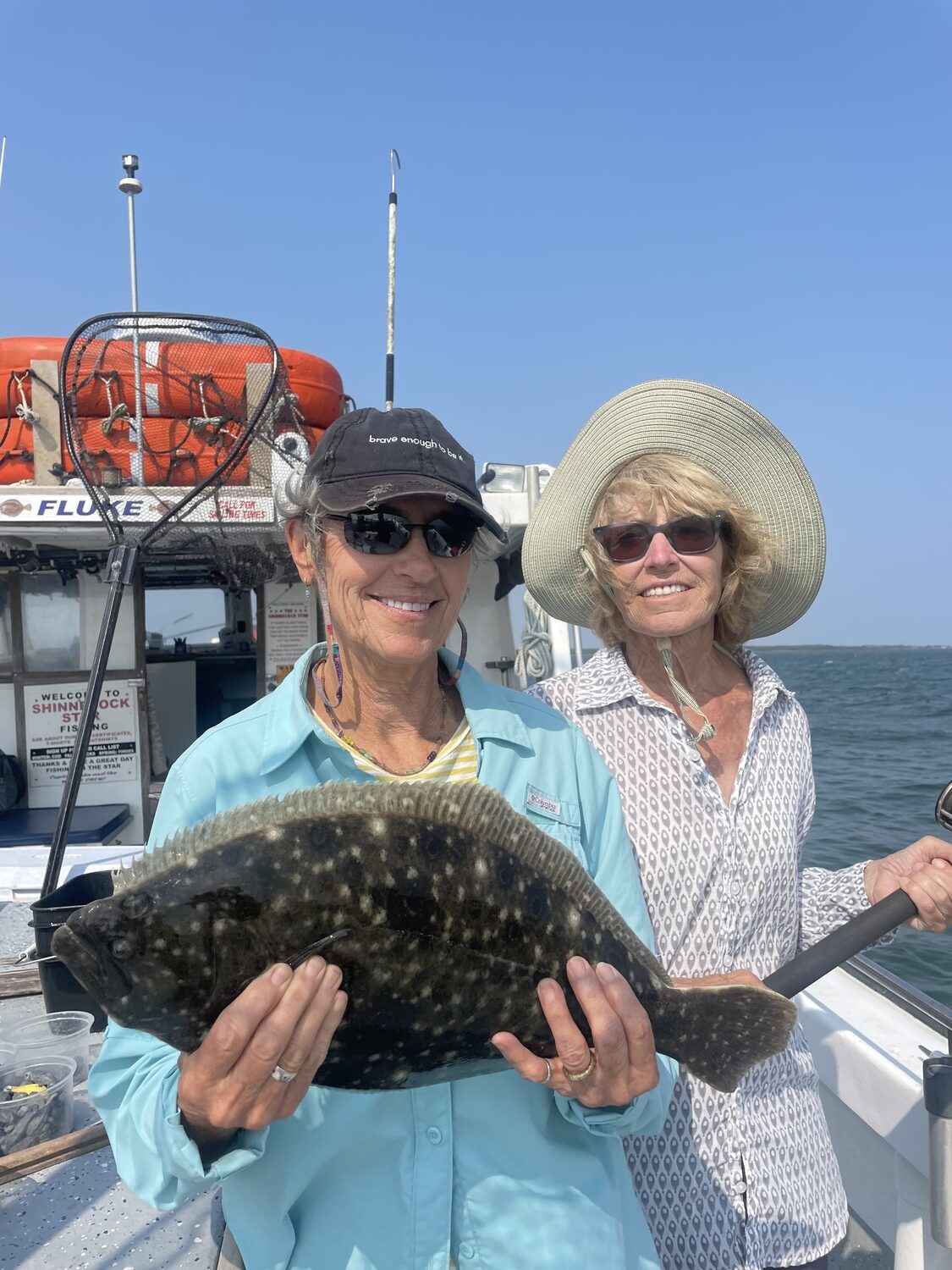 Pat Sanders and Diane Fein enjoyed a day of fluke fishing aboard the Shinnecock Star out of Hampton Bays recently. 
DEENA LIPPMAN