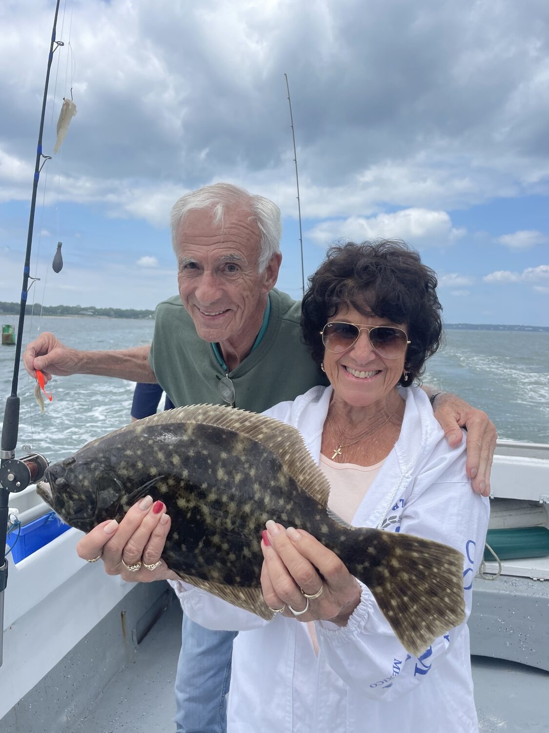 Stephen and Susan Macari of Hampton Bays with a nice Shinnecock Bay fluke caught recently aboard the Shinnecock Star. 
DEENA LIPPMAN