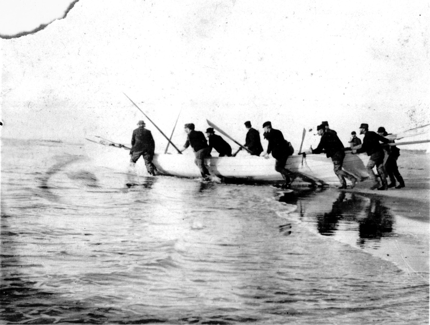 Men Shoving a whale boat into the surf, Amagansett, 1885. THE EAST HAMPTON STAR PHOTO ARCHIVE, LONG ISLAND COLLECTION, EAST HAMPTON LIBRARY