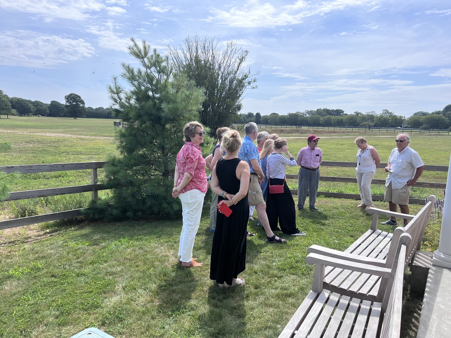 The East Hampton Housing Authority recently held a small reception and dedication of five benches placed at Gansett Meadow in Amagansett in memory of the late commissioners Barbara Jordan, David Lee, Patricia Keegan, Patricia Gilchrest, and Dr. Joe O'Connell. Members of the Town Board, the Housing Authority board, staff, friends and family gathered in their honor. COURTESY EAST HAMPTON HOUSING AUTHORITY