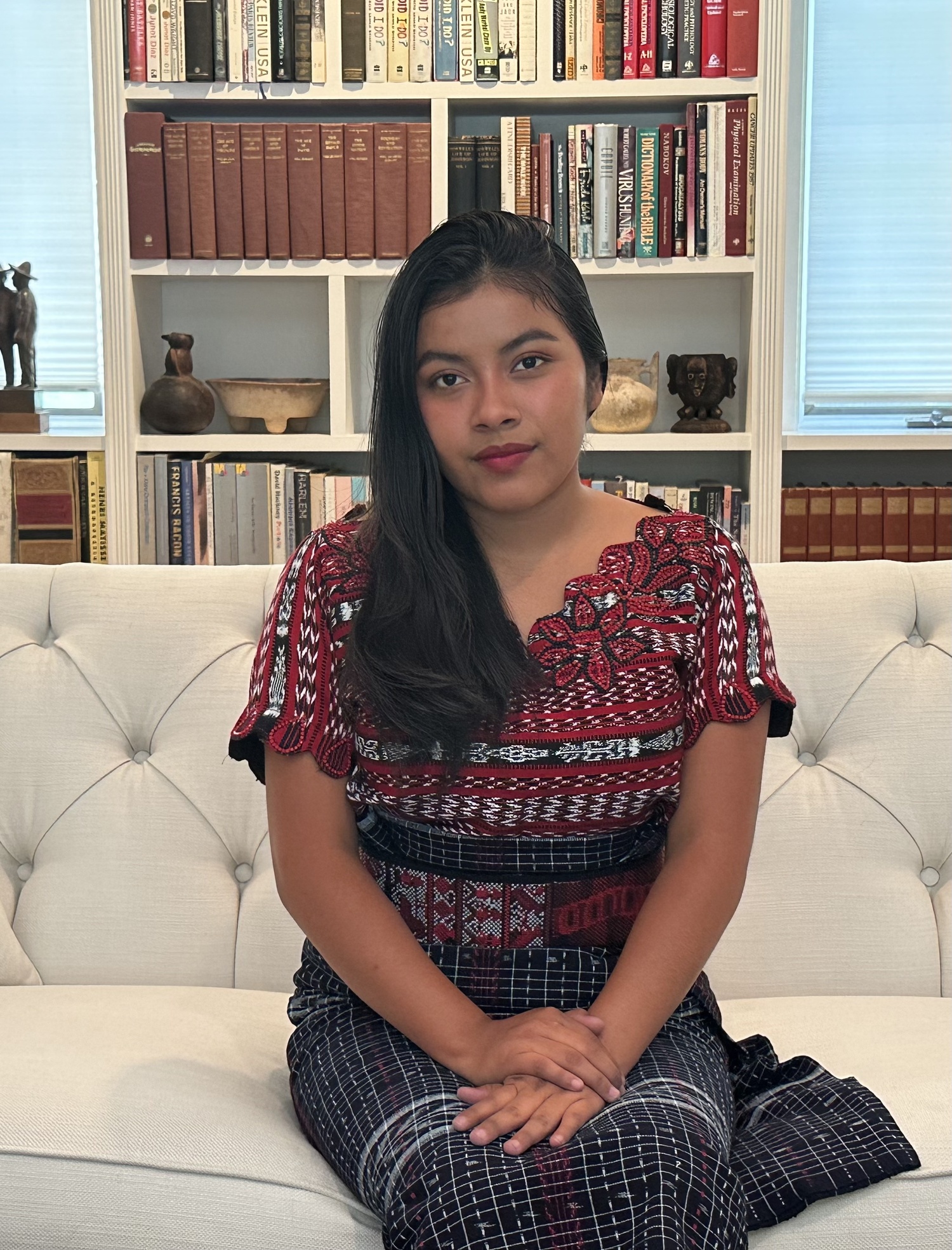 Bilma Pedro, dressed in a traditional Mayan outfit, earned the New York State Seal of Biliteracy in her native language, Qʼanjobʼal, marking the first time it has been recognized in New York State. SARAH TRUJILLO UNDERHILL