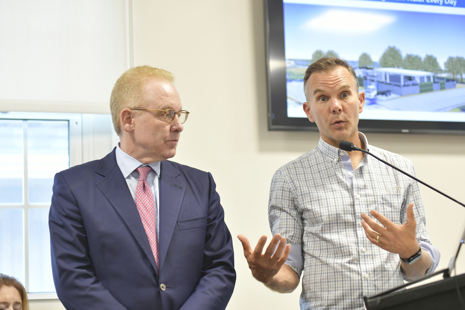 Dr. Christopher Gobler, right, with Lake Agawam Conservancy member Bob Giuffra at Tuesday's work session.  DANA SHAW