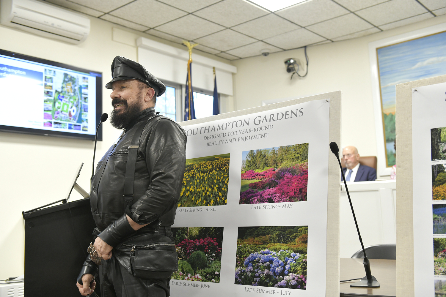 Architect Peter Marino goes over his plans for Southampton Gardens at the Southampton Village work session on Tuesday evening.  DANA SHAW