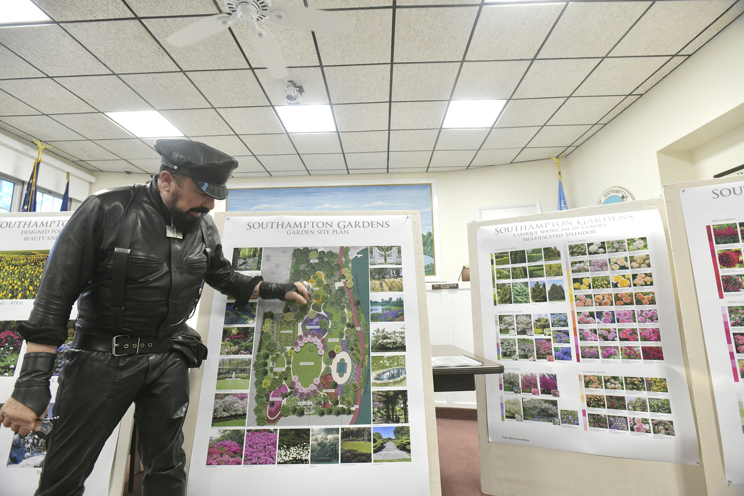 Architect Peter Marino goes over his plans for Southampton Gardens at the Southampton Village work session on Tuesday evening.  DANA SHAW