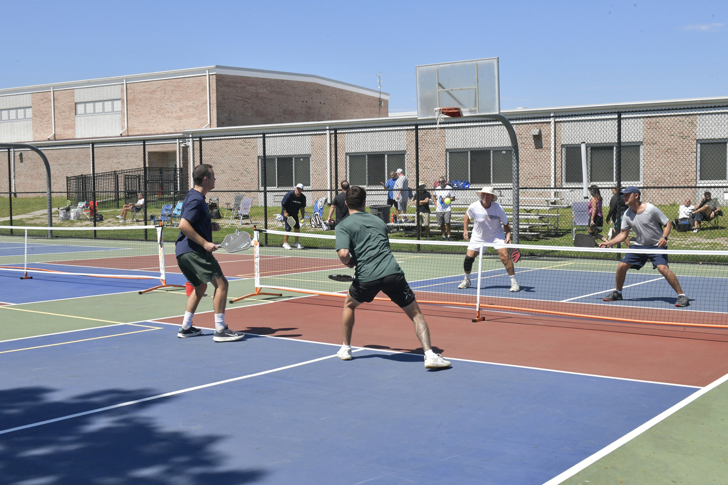 Participants during the pickleball tournament at Hampton Bays High School on Saturday.  DANA SHAW