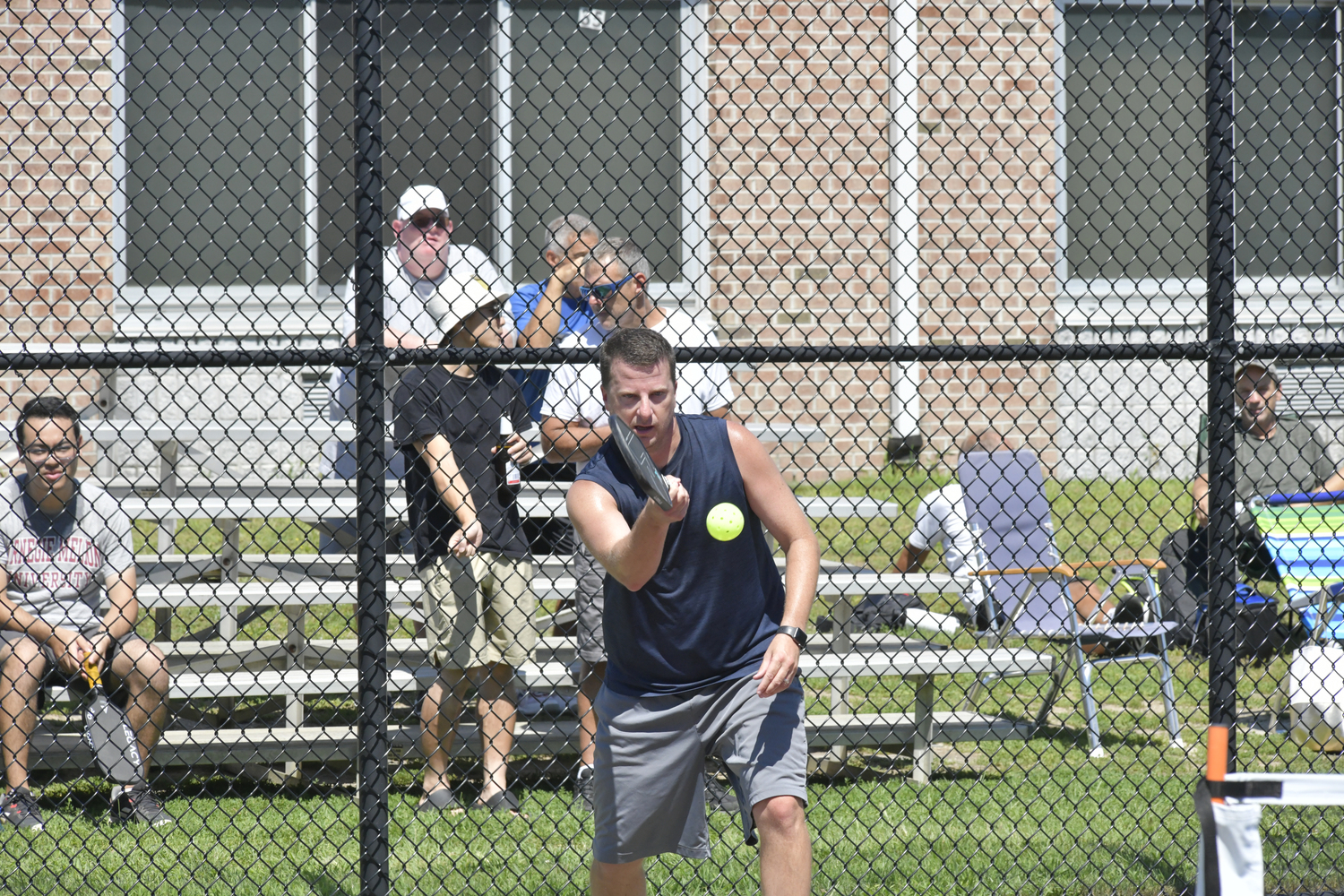 Russ Bank makes a play during the pickleball tournament at Hampton Bays High School on Saturday.  DANA SHAW