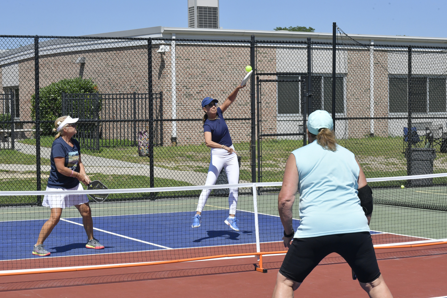 Participants during the pickleball tournament at Hampton Bays High School on Saturday.  DANA SHAW