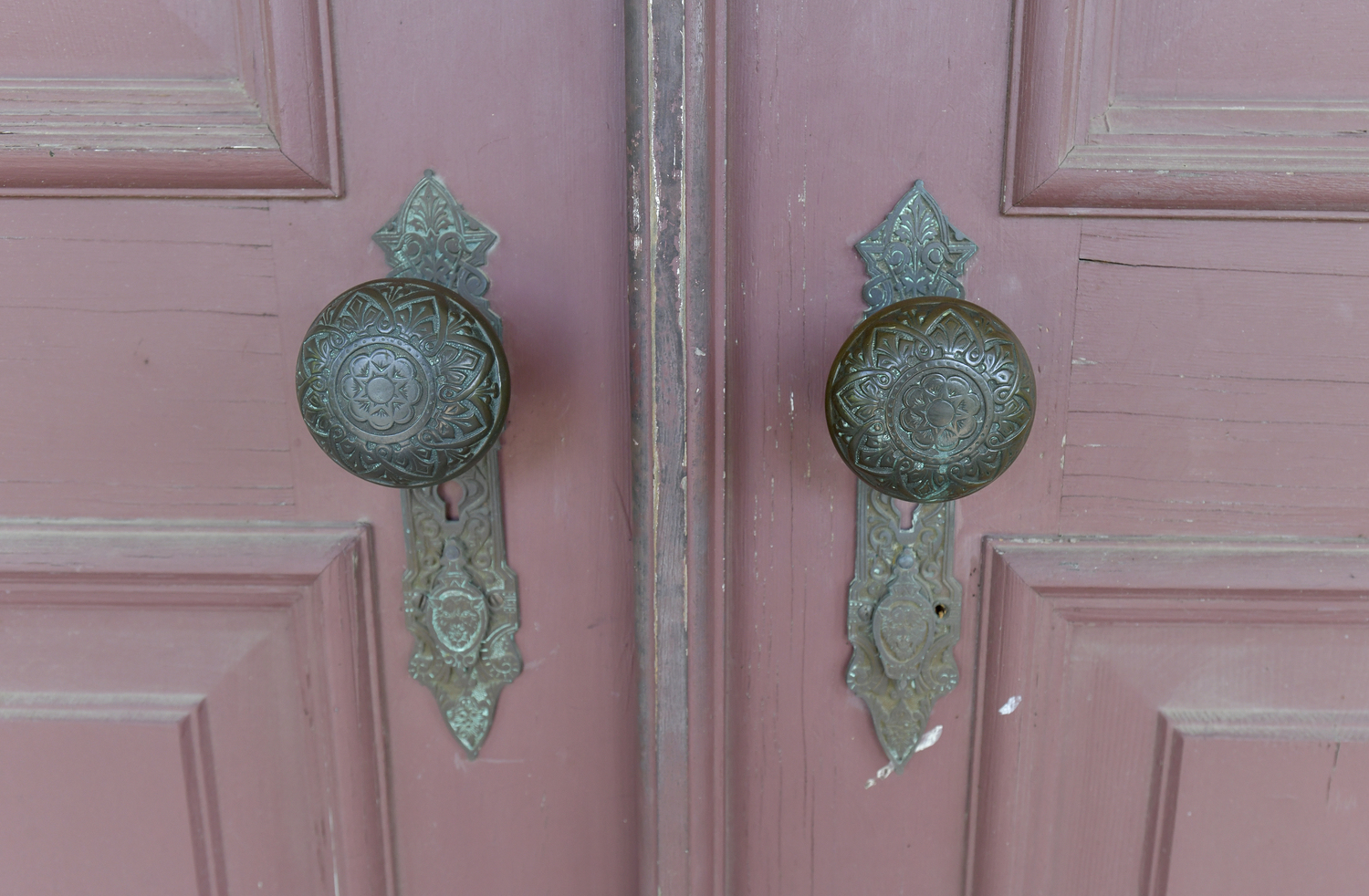 The doorknobs were out for restoration when the original home burned down.  DANA SHAW