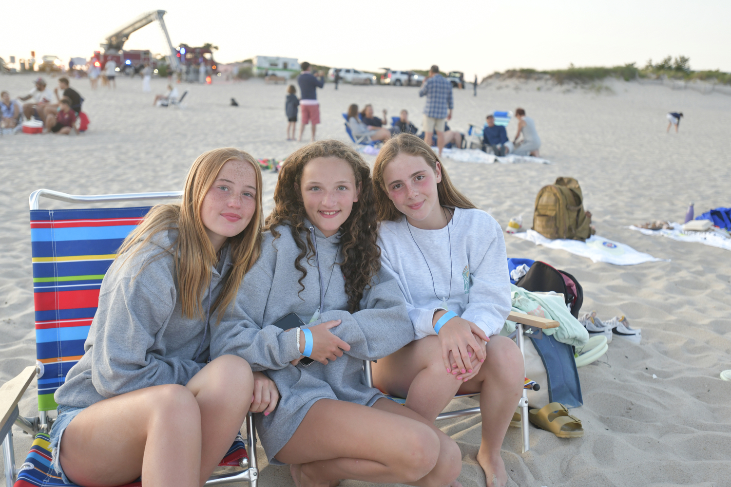 Estee Phair, Olivia Robertson and Ruby Boeding at the Moonlt Plunge for Heart of the Hamptons on Tuesday night at Coopers Beach.  DANA SHAW