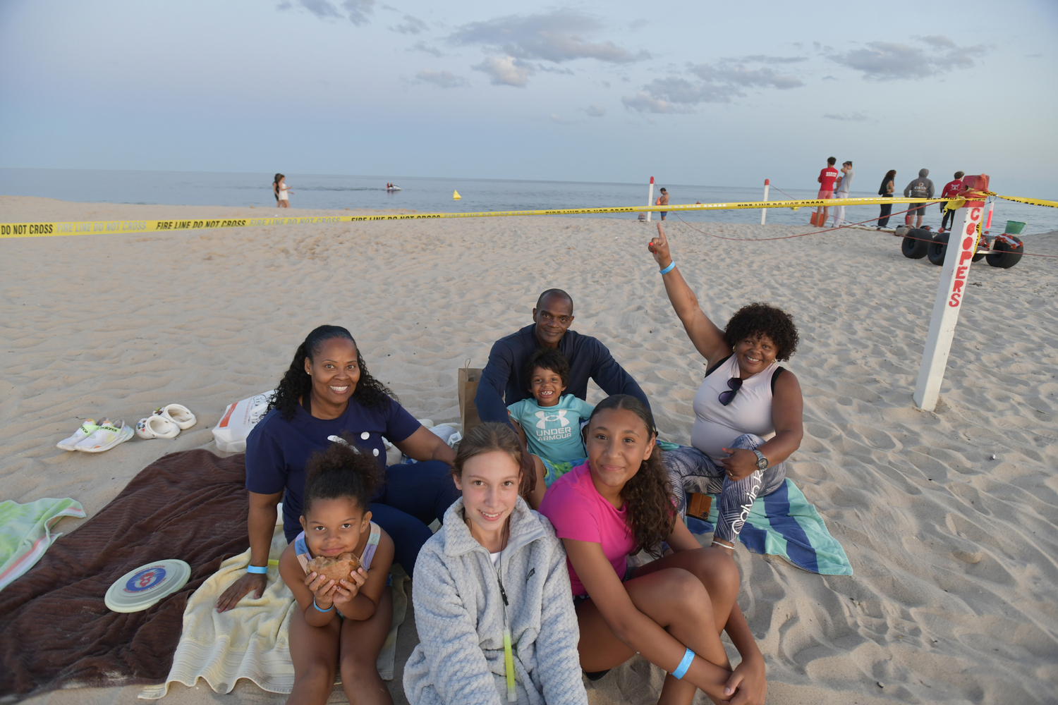 Aleta Parker, Julian Johnson Axol Johnson, Julie Hopson, Juliette Johnson, Kate Vinski and Destiny Parker at the Moonlit Plunge for Heart of the Hamptons on Tuesday night at Coopers Beach.  DANA SHAW