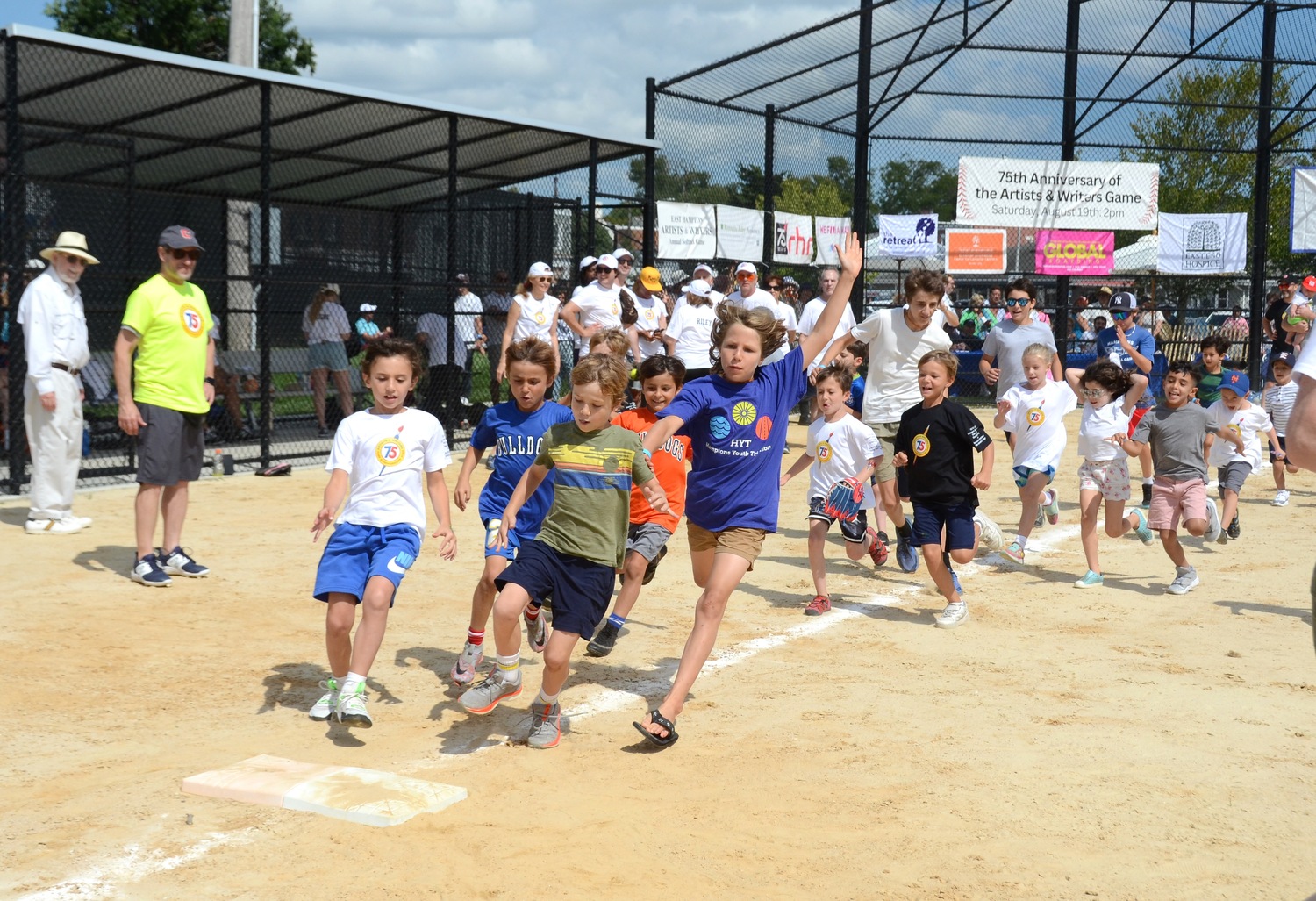 The kids run the bases.    KYRIL BROMLEY