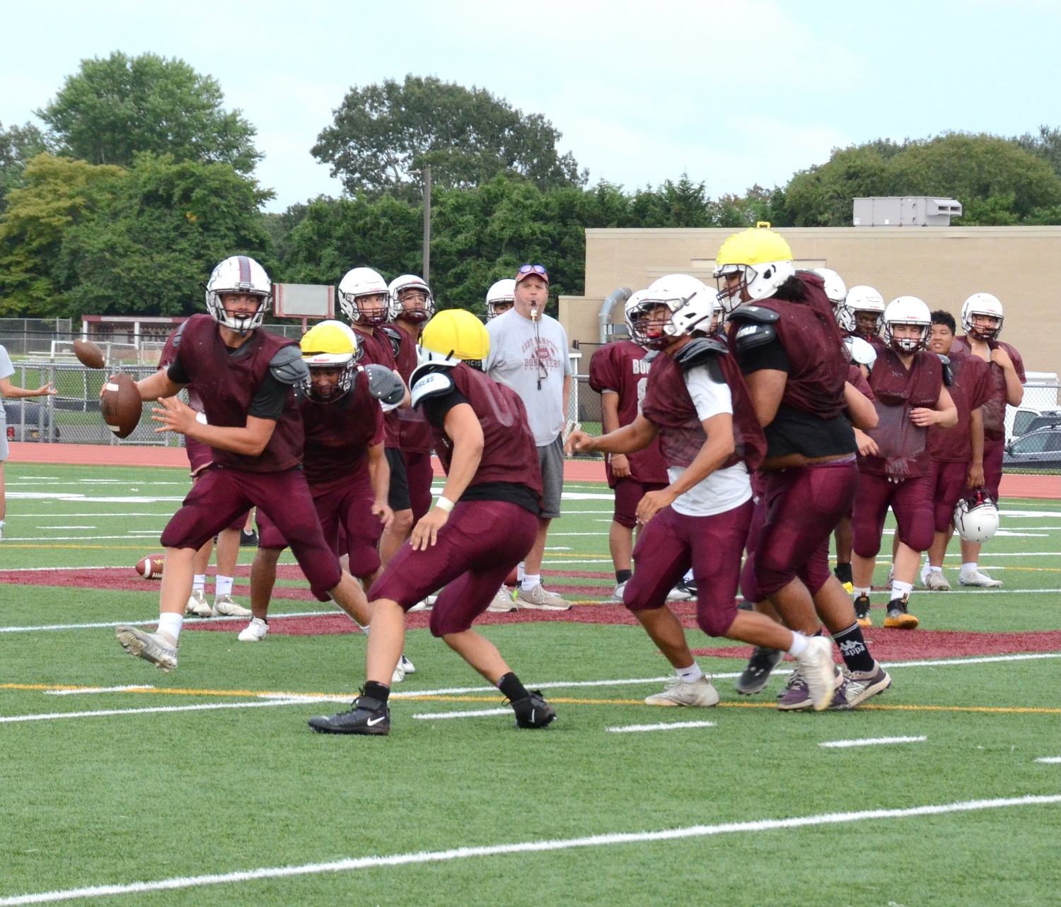 The Bonackers run through drills on Monday.   KYRIL BROMLEY