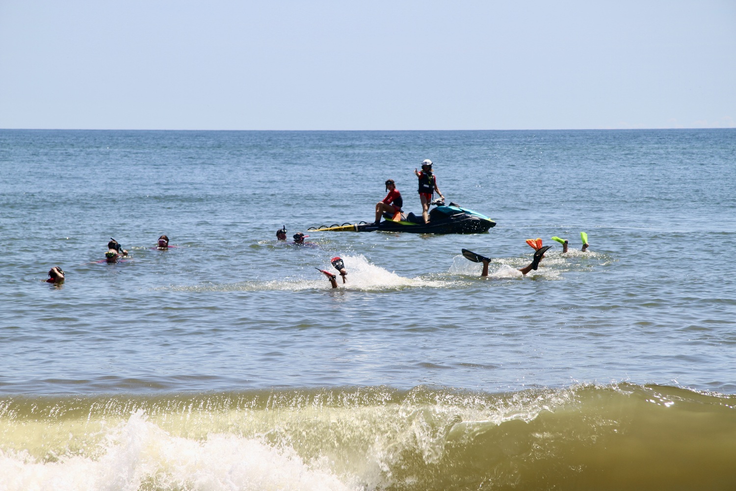 East Hampton Town Lifeguards and members of East Hampton Volunteer Ocean Rescue drilled with lifeguards from New York State Parks on the search for and retrieval of an unconscious, submerged swimmer. 
MICHAEL WRIGHT