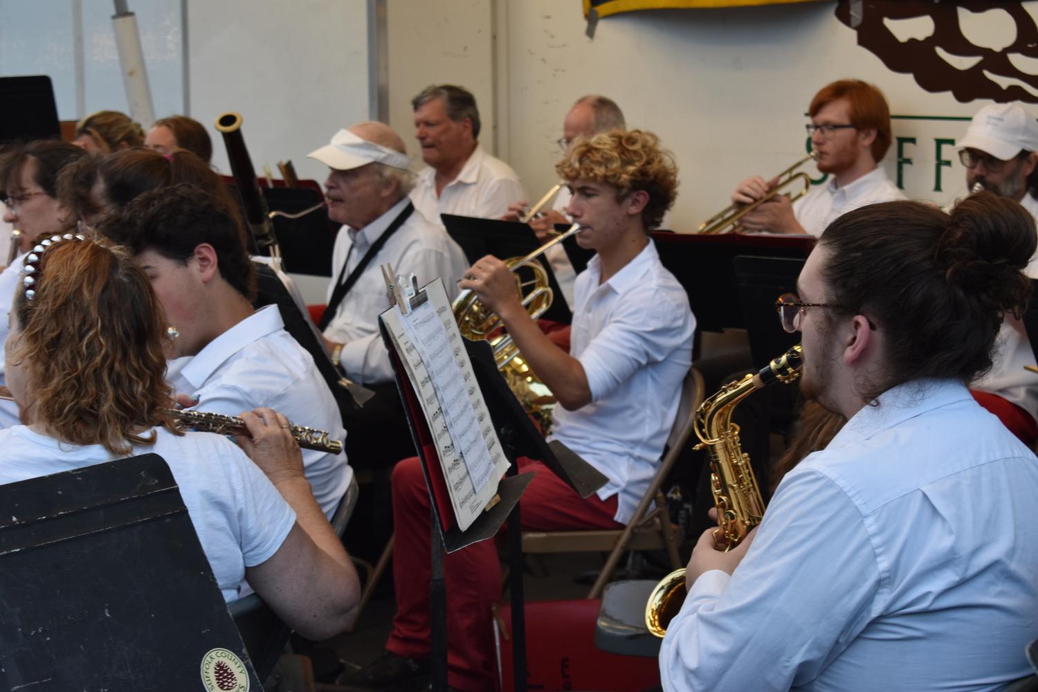 Burke Dunne, a Southampton High School student, plays French horn in the Sag Harbor Community Band. STEPHEN J. KOTZ