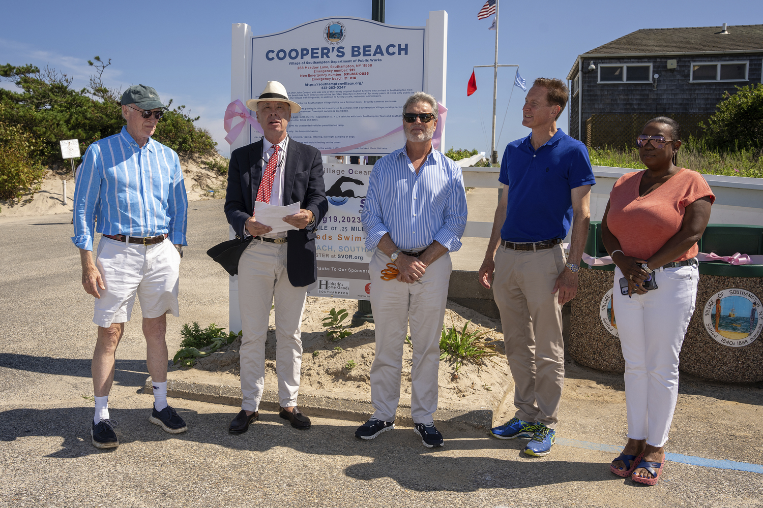 Southampton Association members Chuck Scarborough. Walter Deane, treasurer and Jay Diesing, president, with Southampton Village Mayor Bill Manger and trustee Robin Brown at Coopers Beach on Friday afternoon to unveil renovations to village beach parking lots. Thirteen new beach signs and 39 trash cans have been installed. Over the next several weeks, 22 custom bike racks will be installed. The racks include 1 “Happy Bass” custom rack, 1 “Old Fish 11’” custom rack, and 20 Dero rolling racks. The Association is also working with Trustee Brown and her Junior Ambassadors on benches with phone/computer charging stations.   RON ESPOSITO