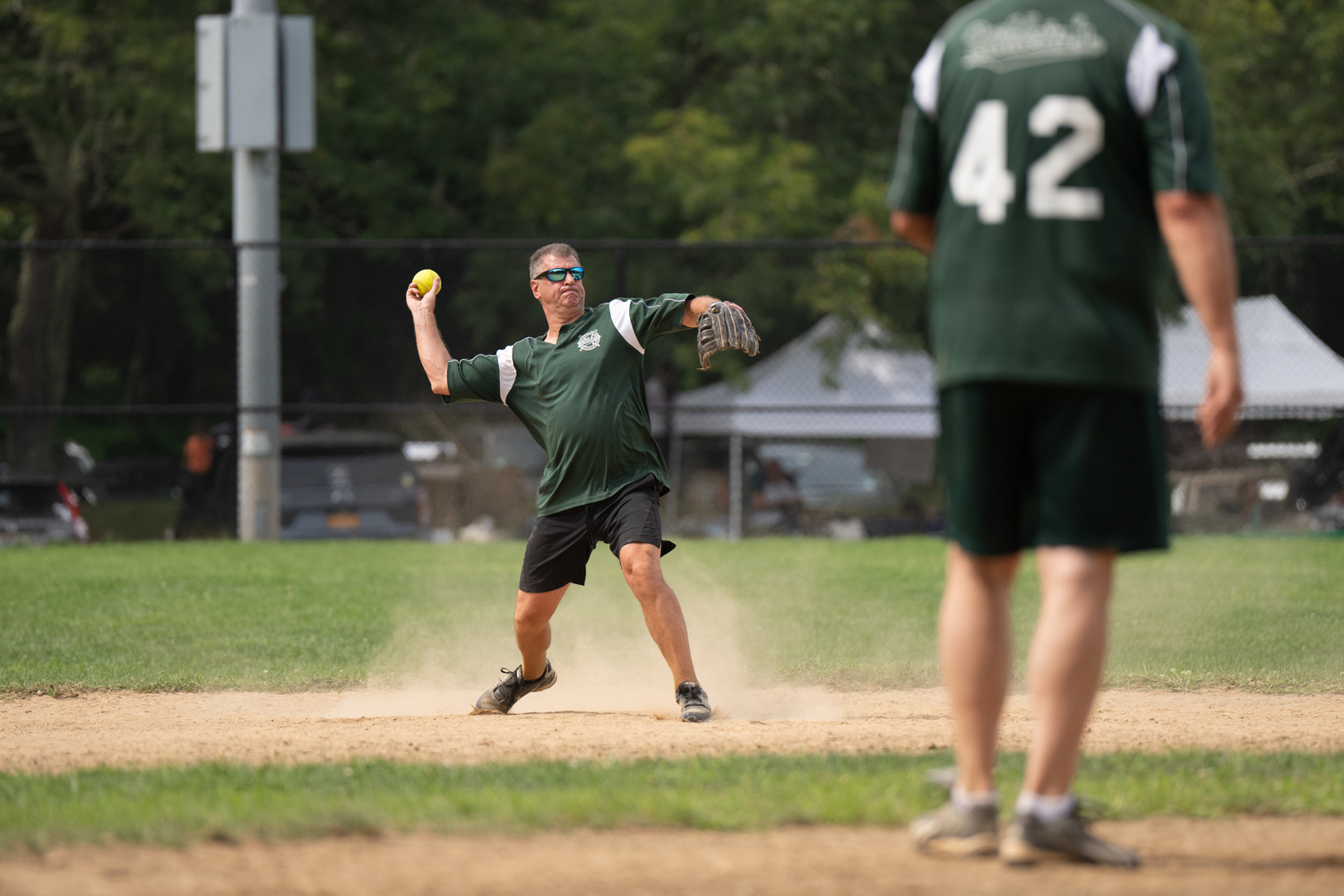 Anthony Dragone fires the ball to first base. RON ESPOSITO