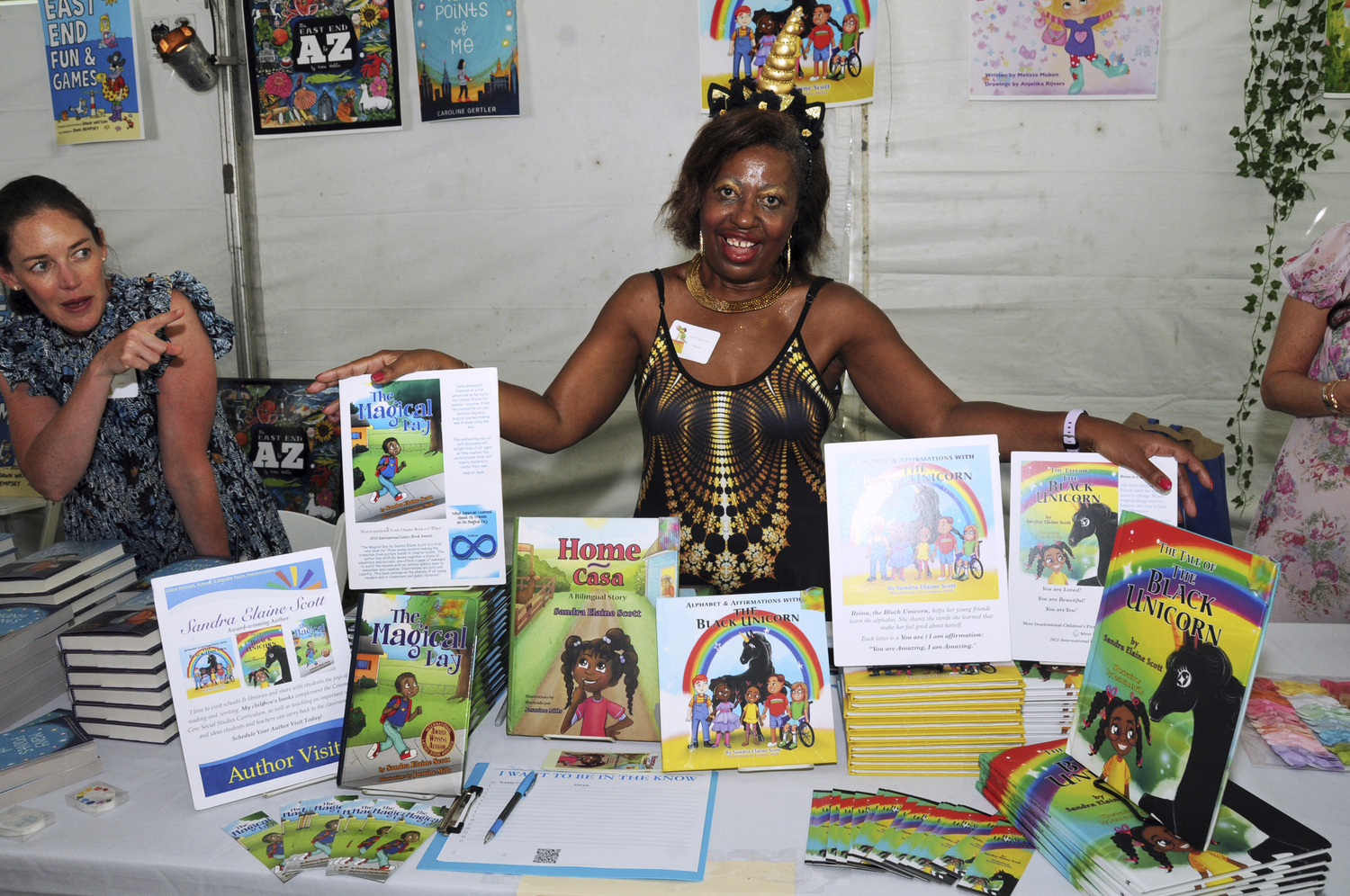 Author Sandra Elaine Scott at the East Hampton Library's annual Children's Fair in Herrick Park on Sunday afternoon.  RICHARD LEWIN