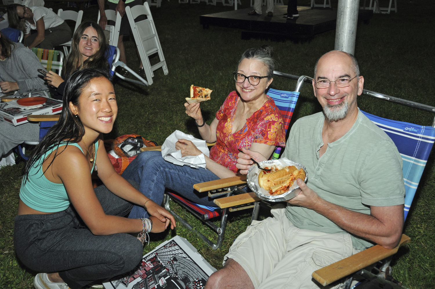 Maya, Denise and Ted Henning at the Hamptons Festival of Music's r inaugural concert u in Herrick Park in East Hampton on August 21. The audience enjoyed the music that accompanied the Charlie Chaplin silent film 