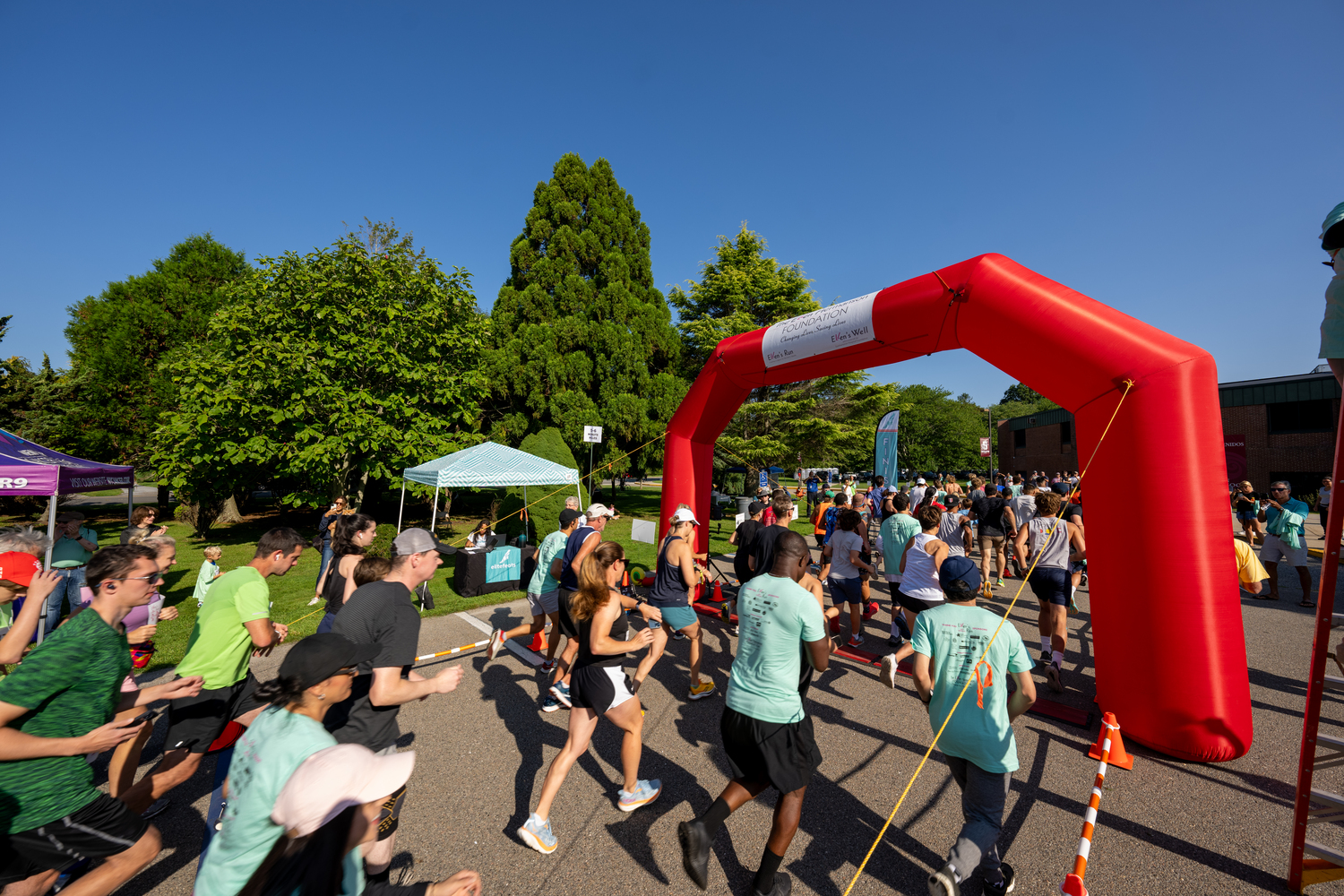 Runners and walkers start the 28th annual Ellen's Run on Sunday.   RON ESPOSITO