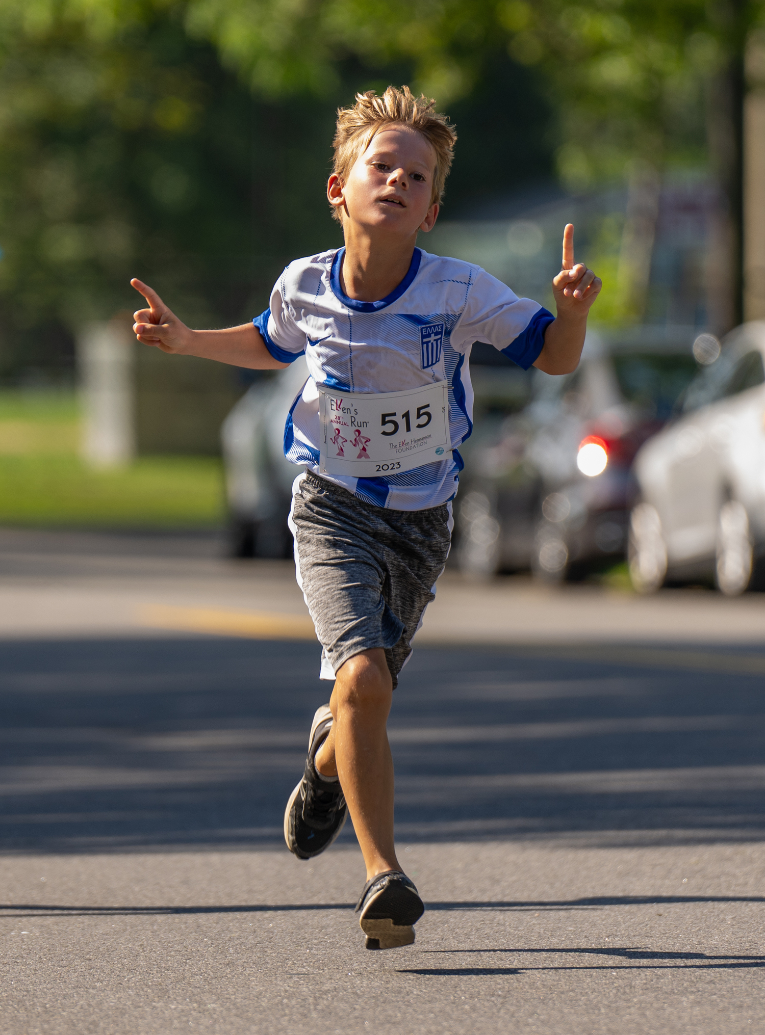 Jack Avlon, 10, of Sag Harbor heads toward the finish line.  RON ESPOSITO