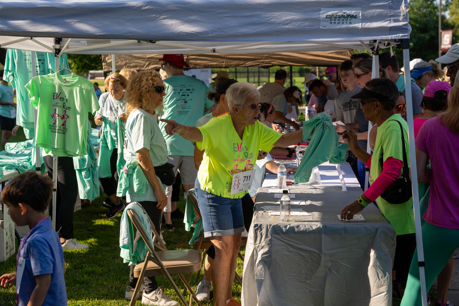 Marlene Berman helps out at the registrant table.  RON ESPOSITO