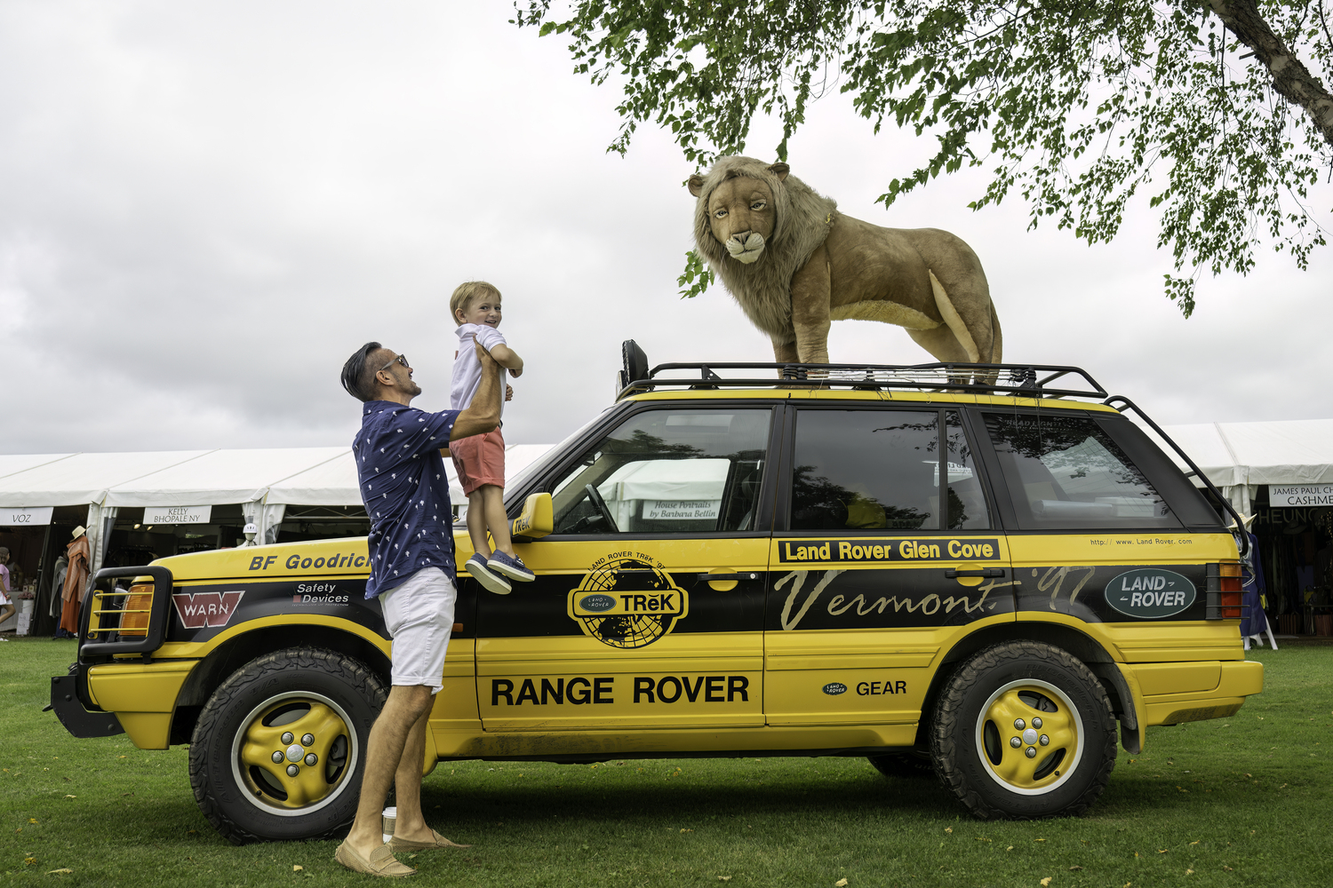Christian Kissel checks out the Land Rover lion with his dad, Eric at the Hamtpon Classic.  MARIANNE BARNETT