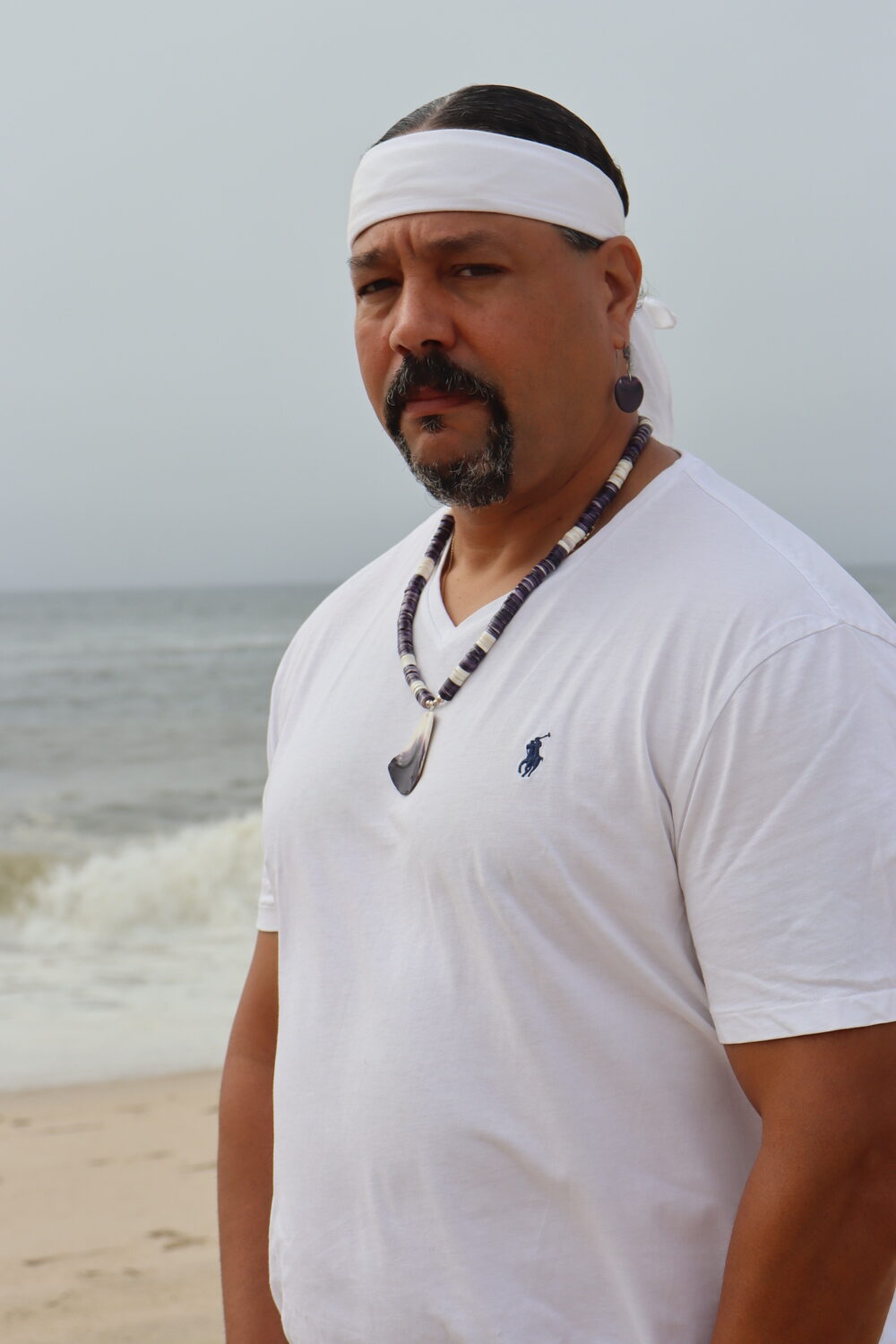 Gordell Wright has been making wampum jewelry, belts and beads for 13 years, mastering an art that has deep roots and significance in Shinnecock culture. CAILIN RILEY