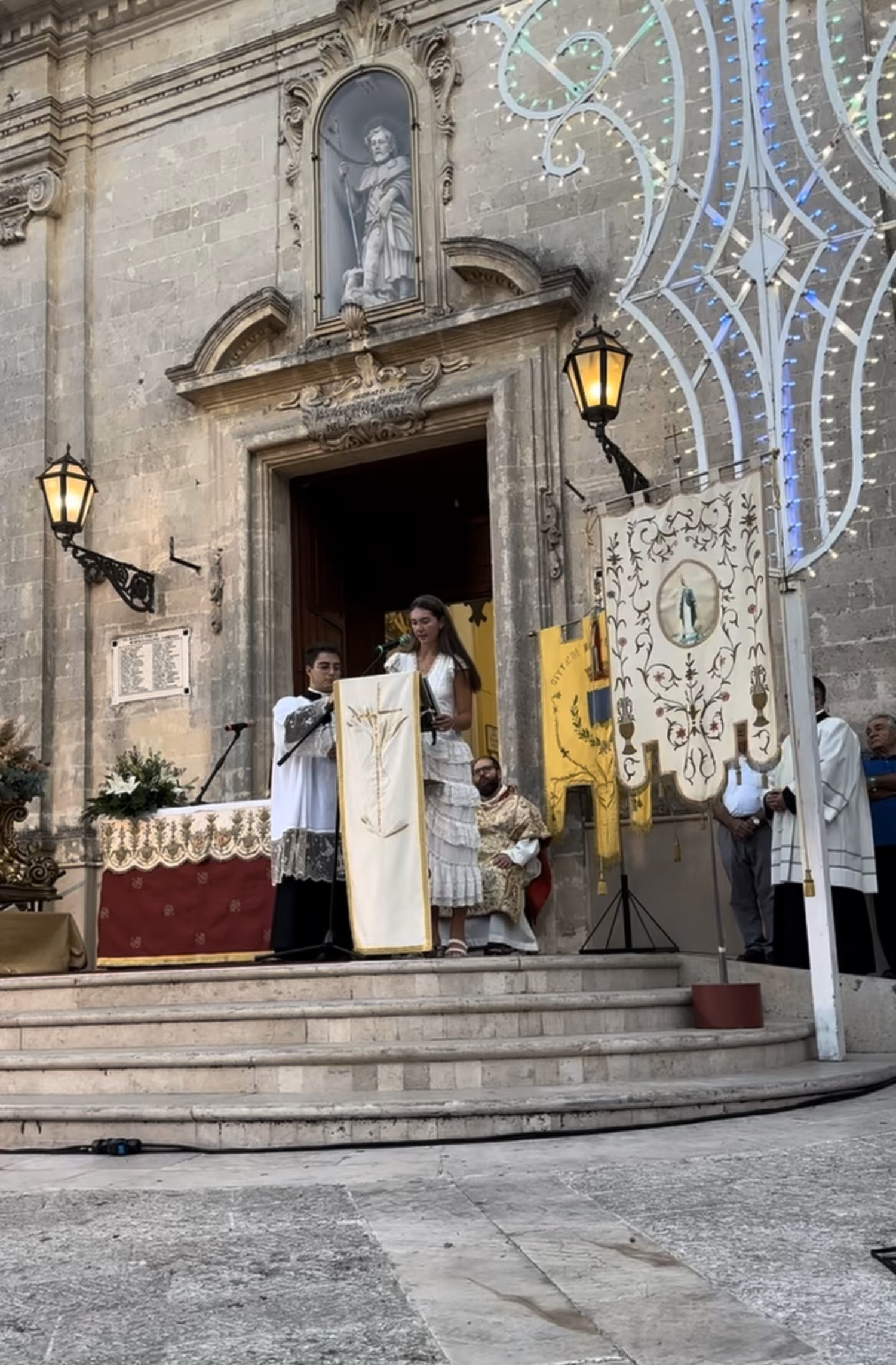 Ella Carriero reads during the dedication Mass.