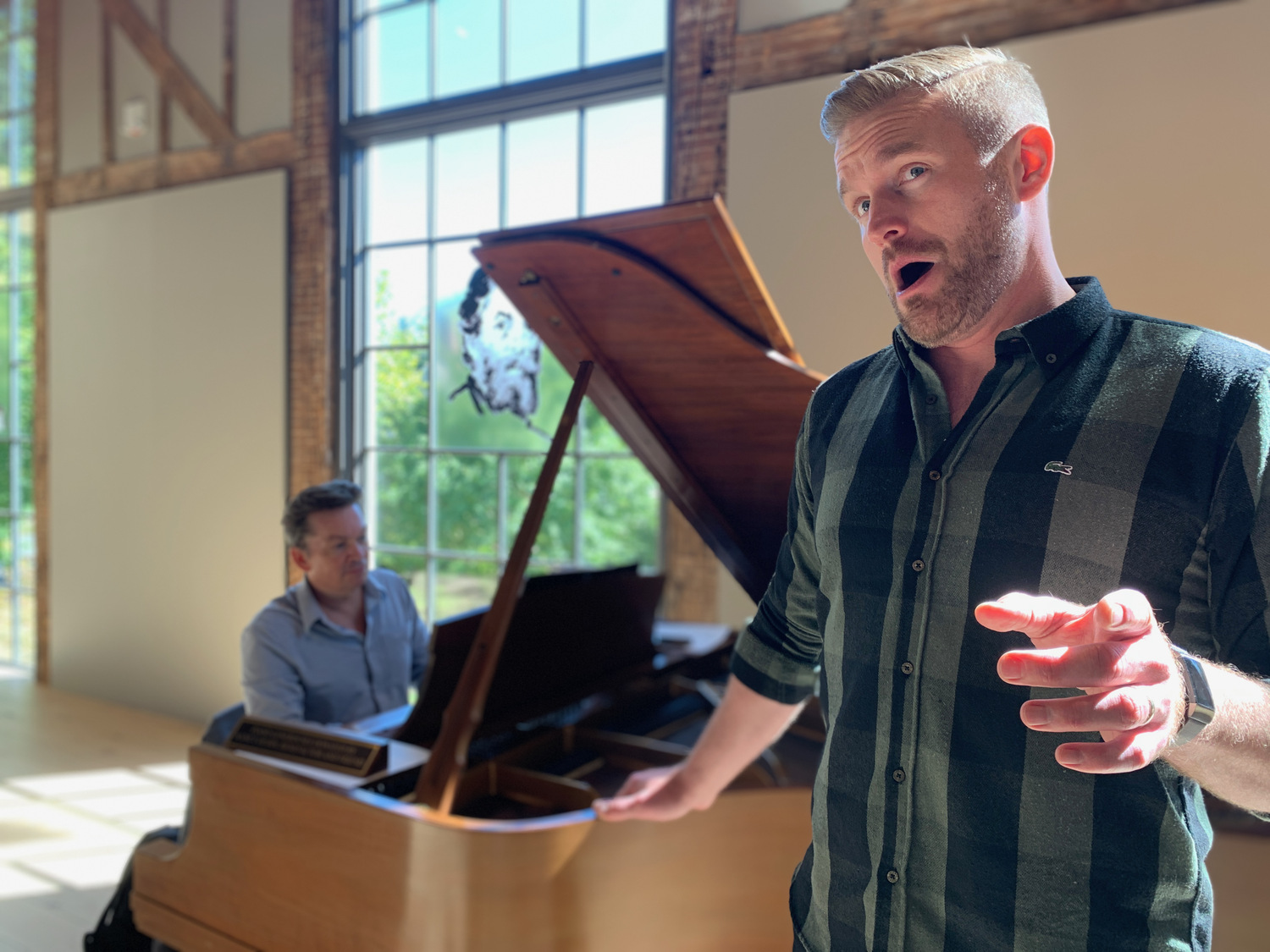 Sag Harbor Song Festival musical director Robert Tweten rehearsing with baritone Jarrett Ott at The Church in advance of the 2022 festival. ANNETTE HINKLE