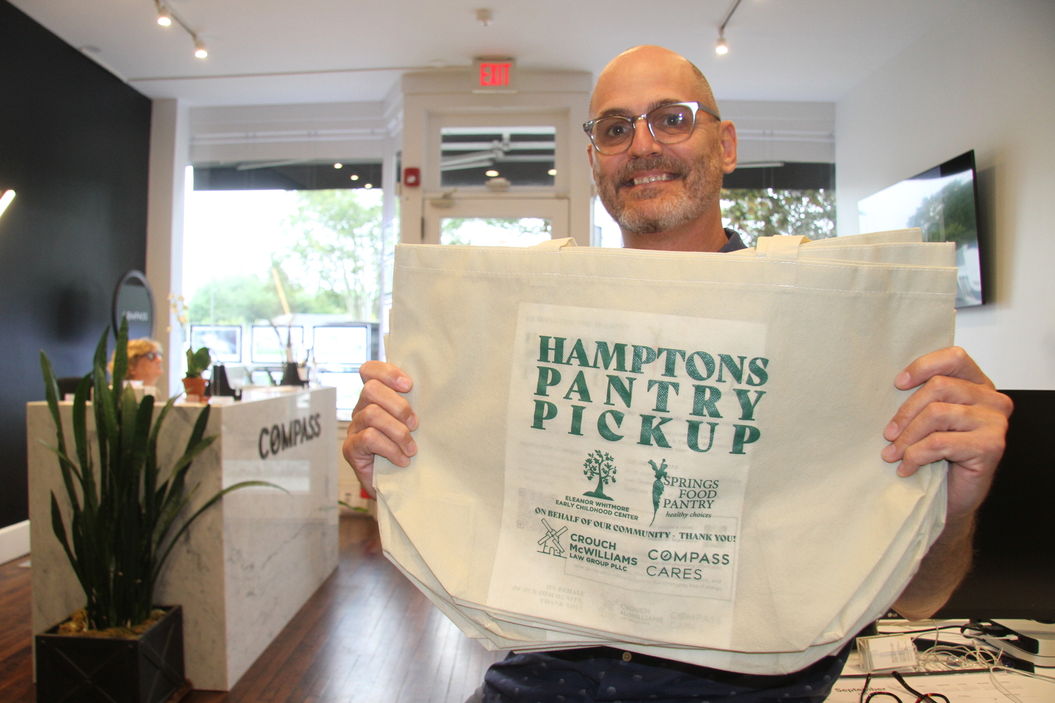 Joe Fuer of Compass, which partnered with Crouch McWilliams to kick-start the Hamptons Pantry Pickup program, collecting unwanted food from summer visitors vacating their homes after Labor Day. 
MICHAEL WRIGHT