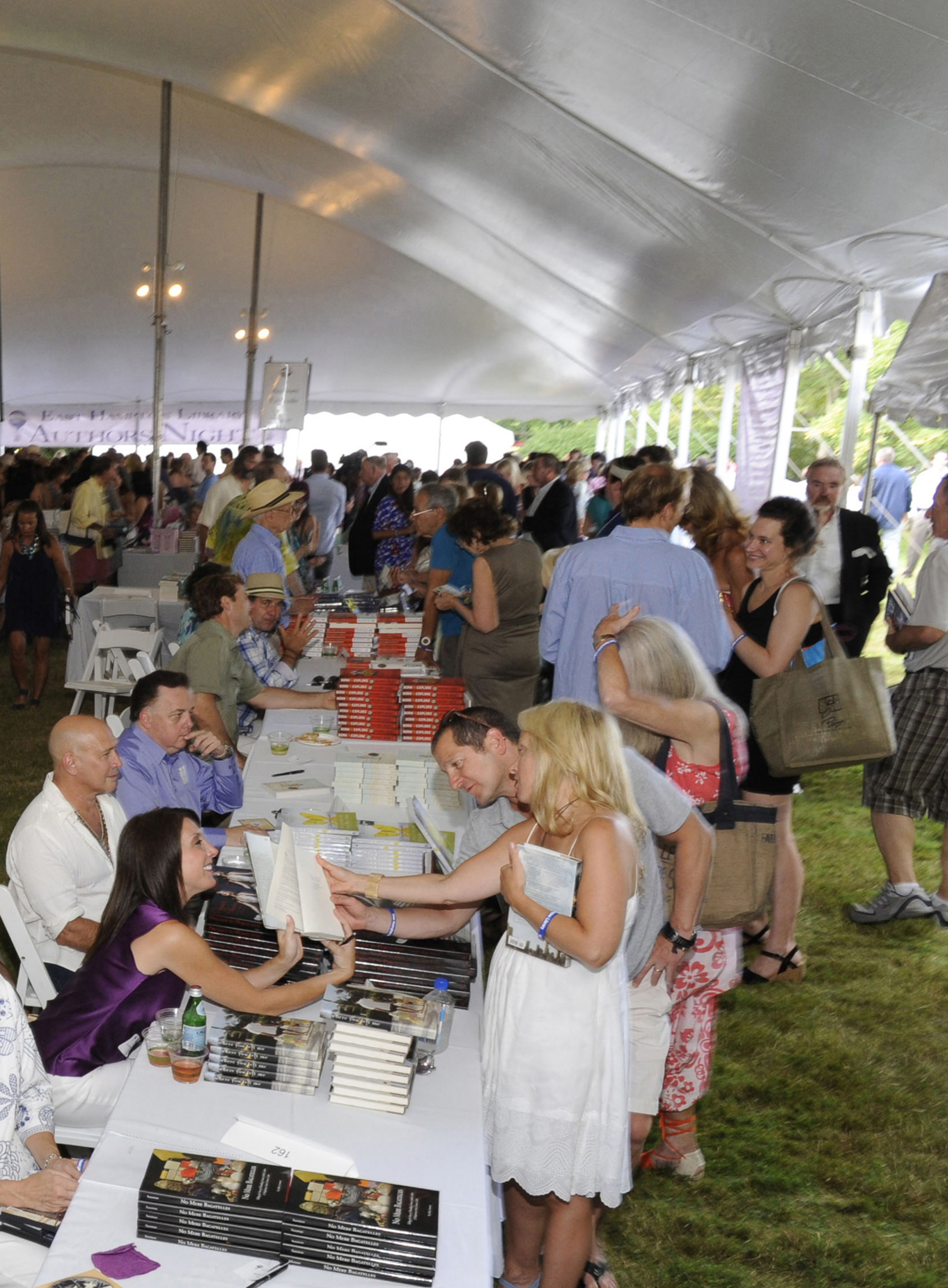 People under the tent at Authors Night. EUGENE GOLOGURSKY