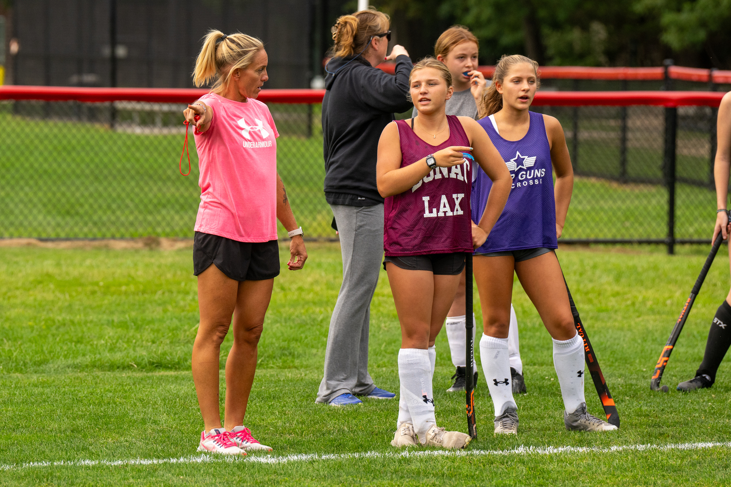 Laura DeSario speaks to her players during practice on Monday.   RON ESPOSITO