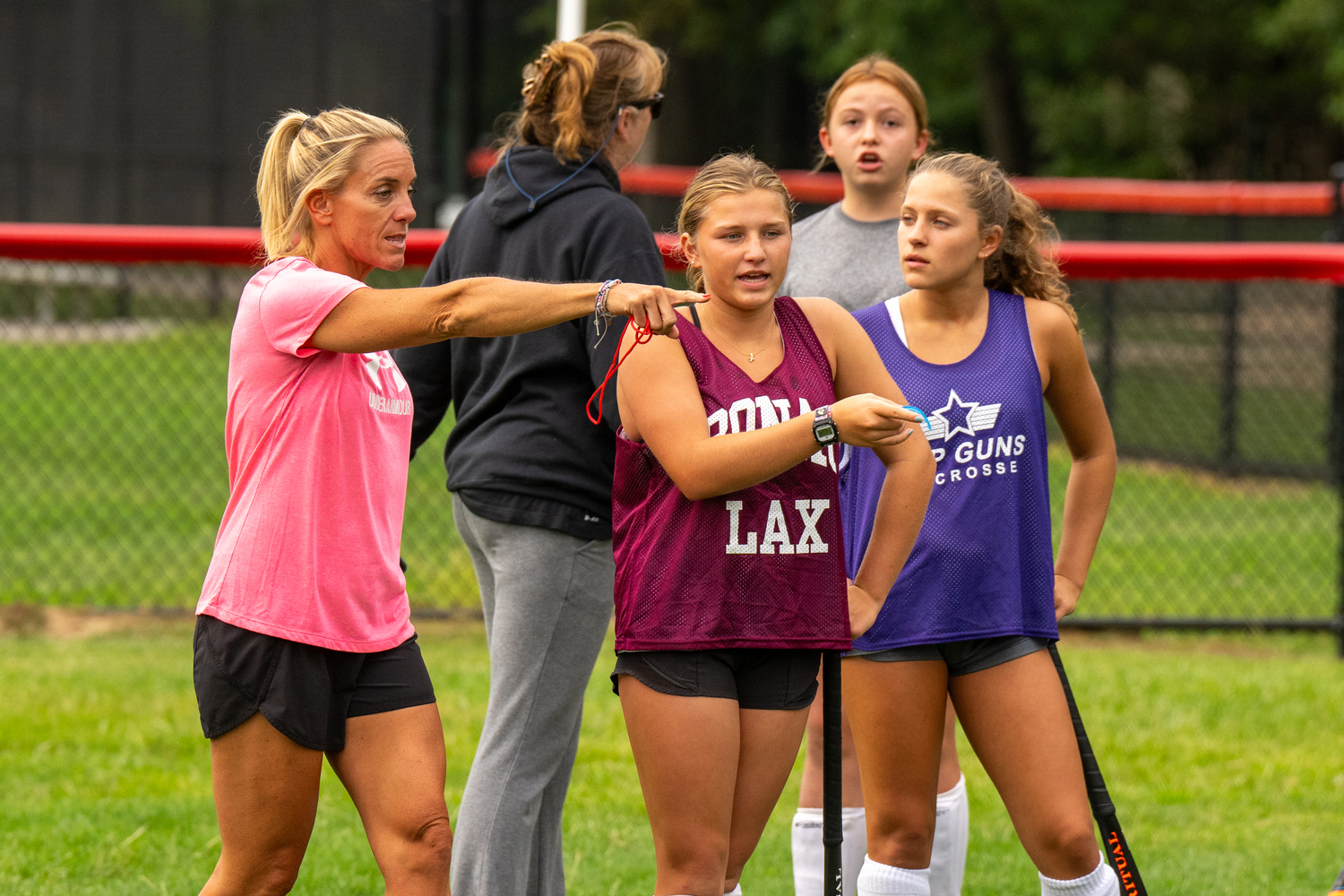 Laura DeSario speaks to her players during practice on Monday.   RON ESPOSITO