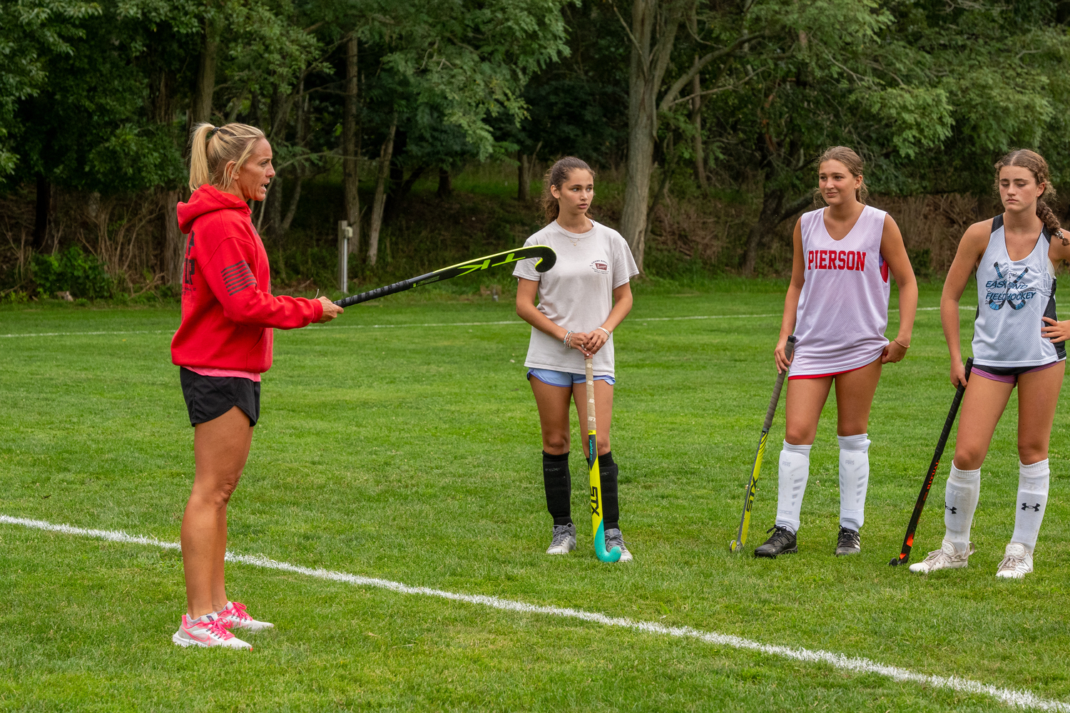 Laura DeSario talks to her players during practice on Monday.   RON ESPOSITO