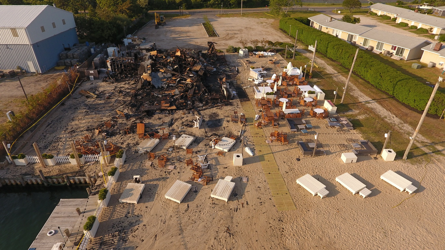 The property had been slated to open with a combination of indoor and outdoor dining and lounge seating on Memorial Day weekend, but a fire destroyed the main building, long home to Rick's Crabby Cowboy Cafe, the night before. 
MICHAEL WRIGHT