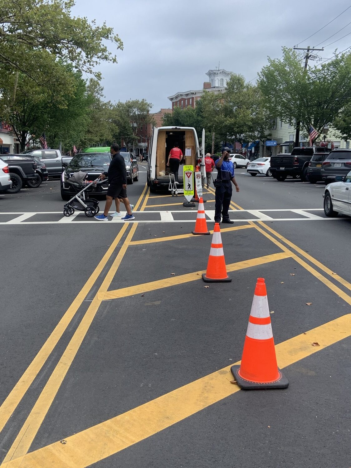 Sag Harbor Village this week placed traffic cones in the middle of Main Street to prevent trucks that unload there from blocking crosswalks. STEPHEN J. KOTZ