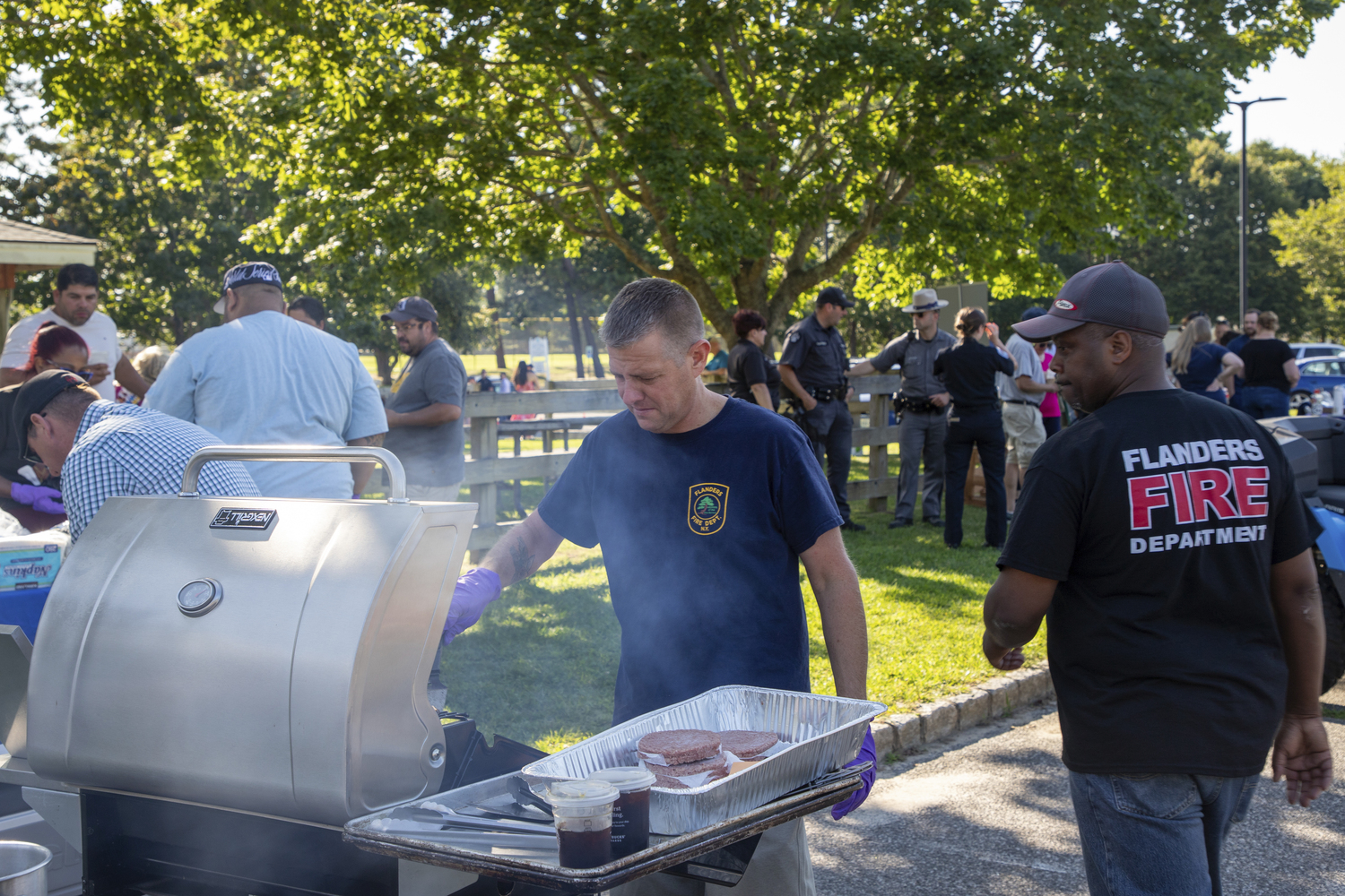 Southampton Town Police, Southampton and the Southampton Bureau hosted the annual National Night Out on August 2 in Red Creek Park in Hampton Bays. The evening featured demonstrations of police and emergency vehicles, car and bike safety checks,  and a BBQ cooked up by the Flanders Fire Department.    MICHAEL O'CONNOR