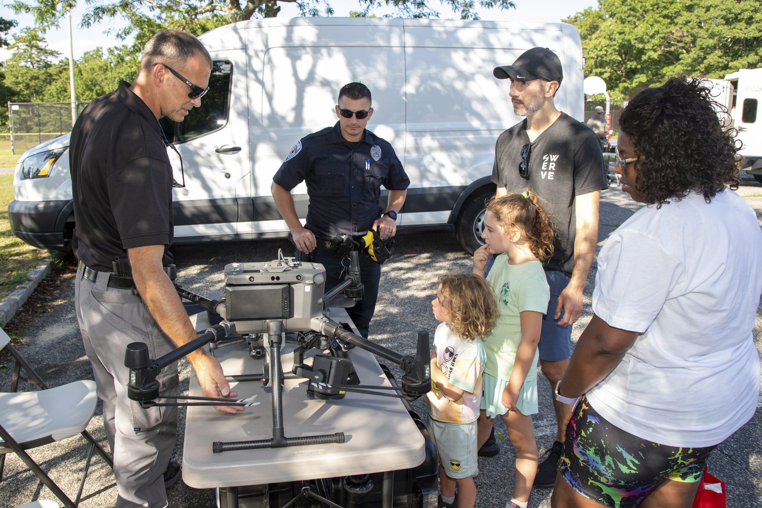 Southampton Town Police, Southampton and the Southampton Bureau hosted the annual National Night Out on August 2 in Red Creek Park in Hampton Bays. The evening featured demonstrations of police and emergency vehicles, car and bike safety checks,  and a BBQ cooked up by the Flanders Fire Department.    MICHAEL O'CONNOR