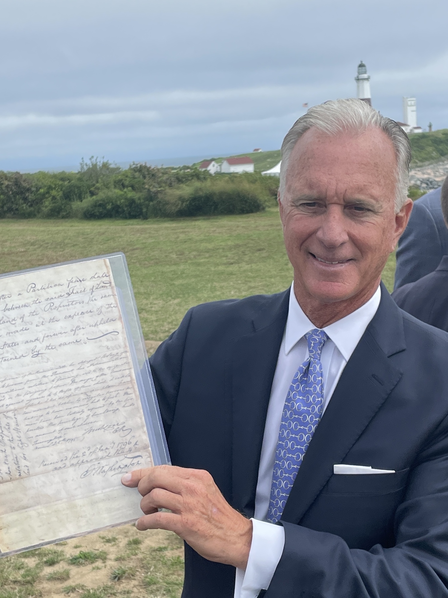 Joe Gaviola, the keeper of the Montauk Lighthouse, with the original document, singed by George Washington, authorizing the federal purchase of Turtle Hill, the promontory that the lighthouse would be built on in 1796. 
MICHAEL WRIGHT