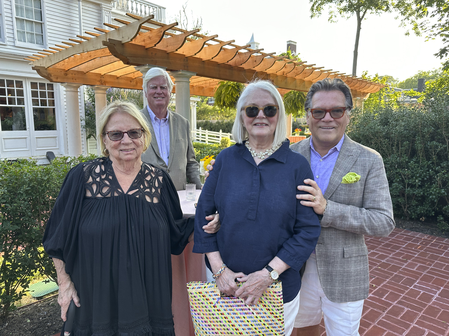 Elizabeth Lear, Sean Deneny, Nancy McGann and Peter Hallock at the Southampton History Museum.  GREG D'ELIA